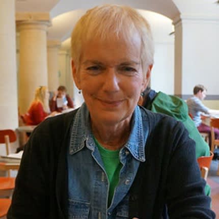 woman with short haircut smiling