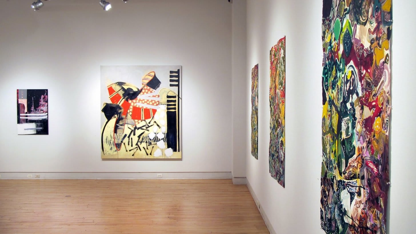 5 paintings in a gallery