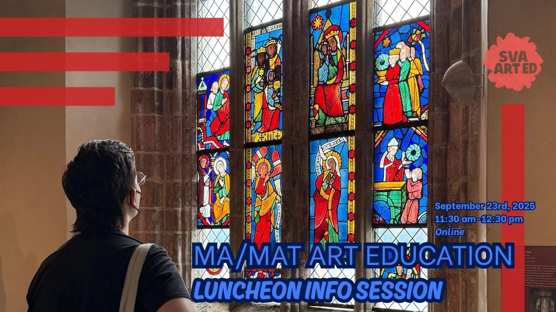 A person with their back turned to the camera looks up at stained glass windows.