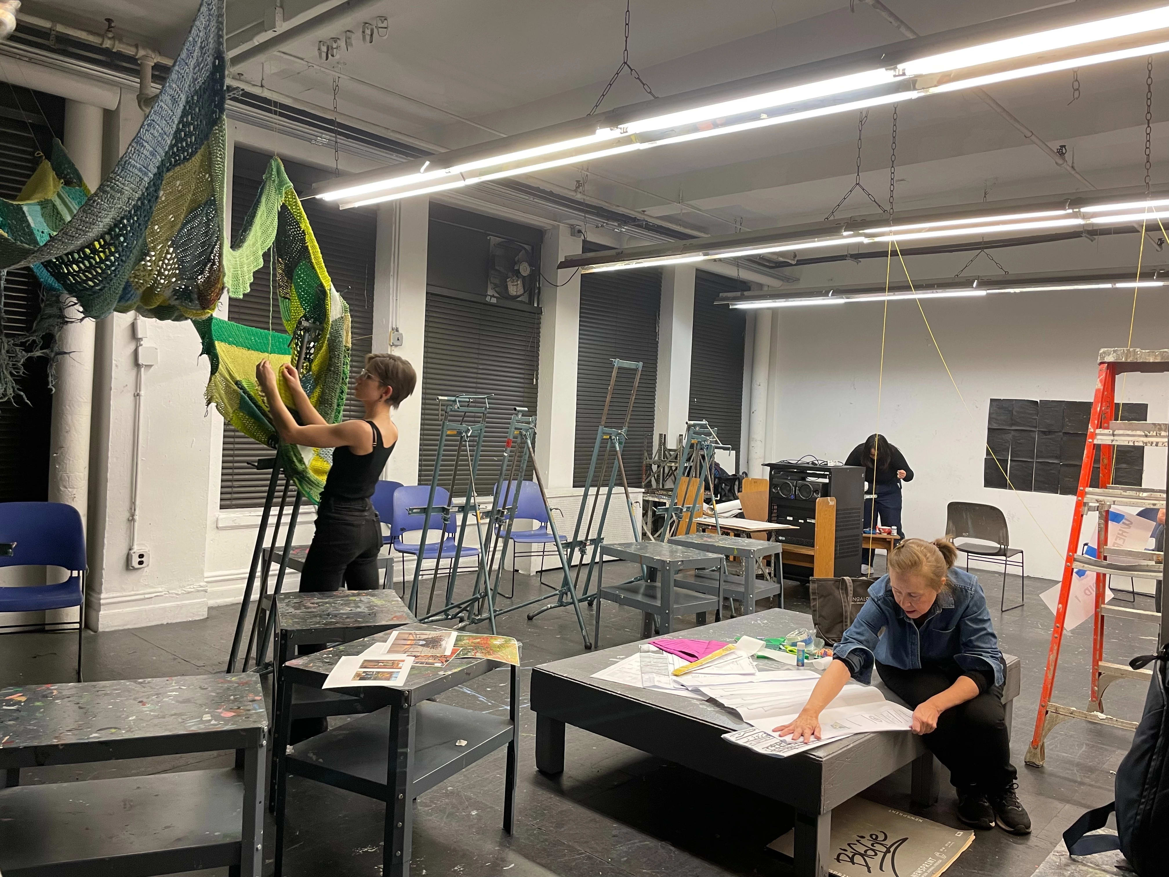 Students working in the classroom in the course Drawing as Social Practice.