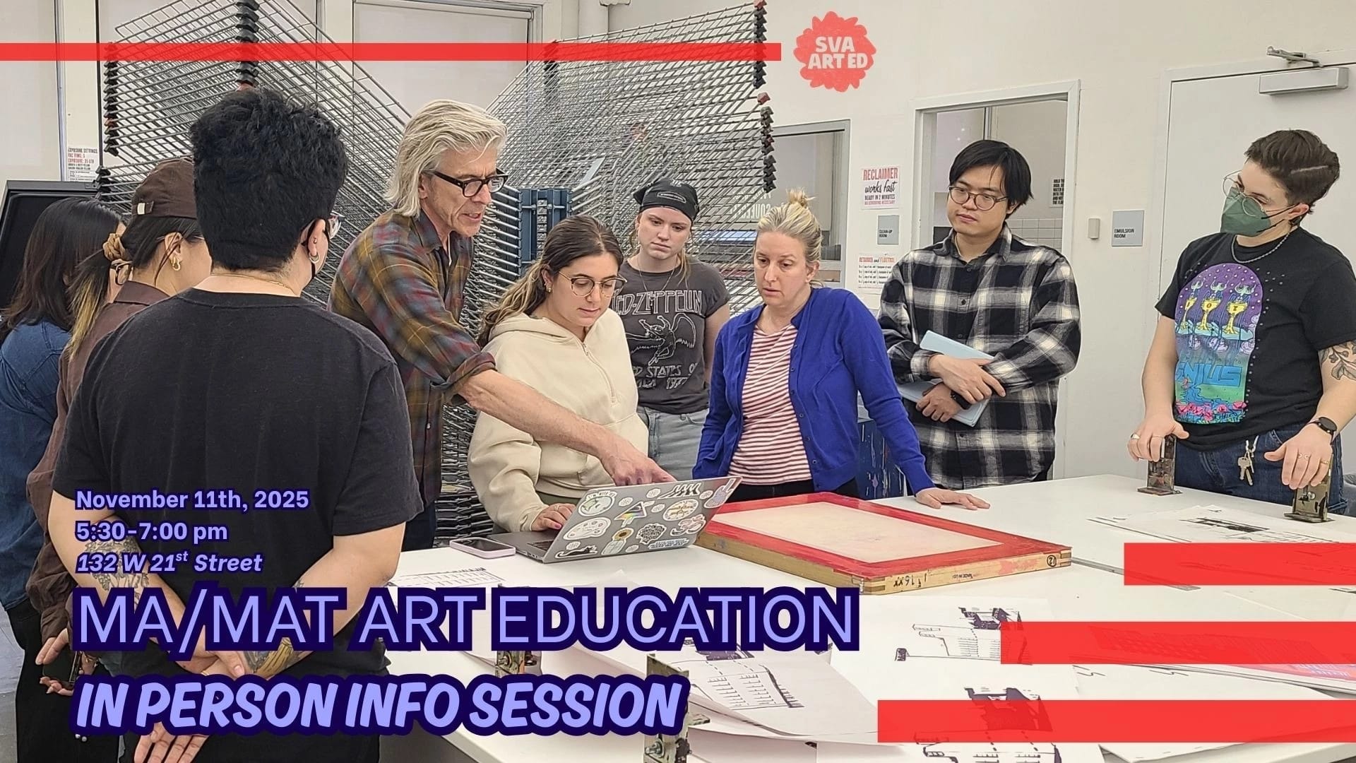 A group of people over look as an instructor with glasses points to a student's laptop screen in a printmaking studio where a printmaking screen lies on the table in front of them.