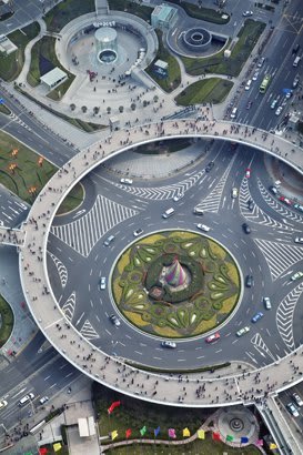 An aerial view of a roadway and pedestrian walkways.