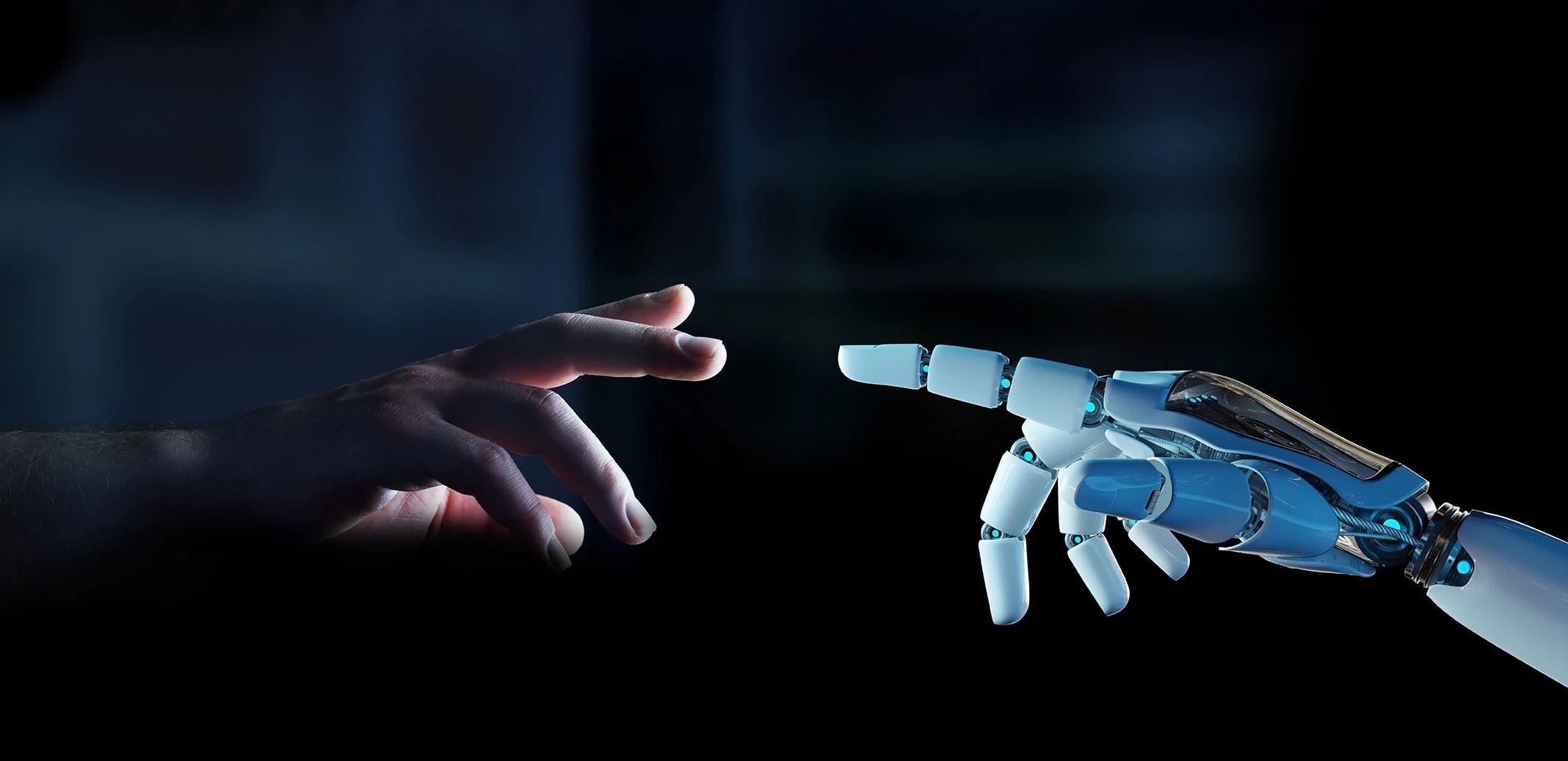 Human hand and robot hand reaching towards one another