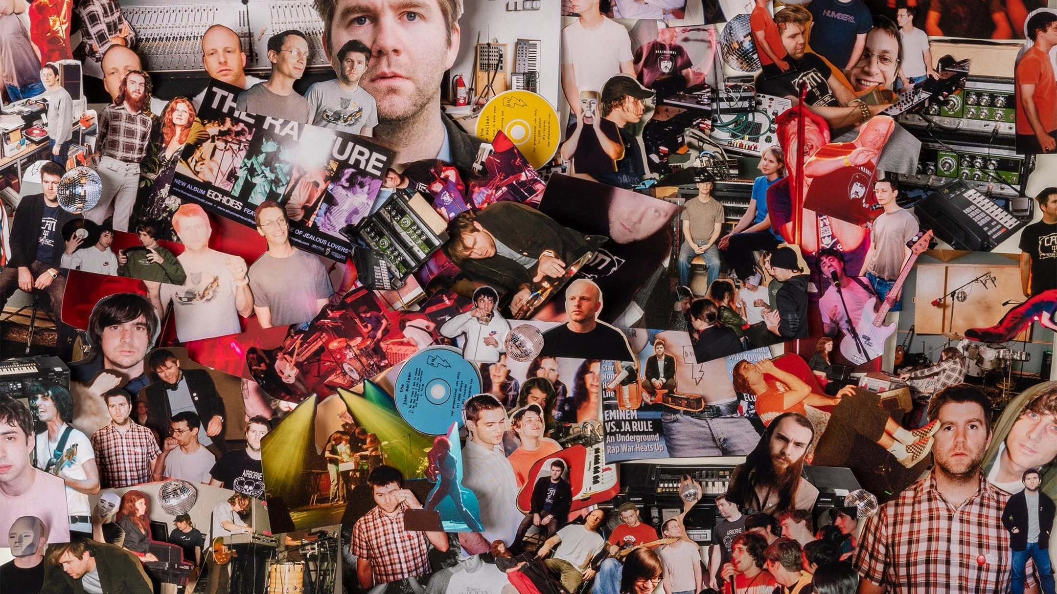 A color photograph of various cutouts of images that documented DFA Records, an indie record label. The majority of the cutouts are of people involved with the record label. 