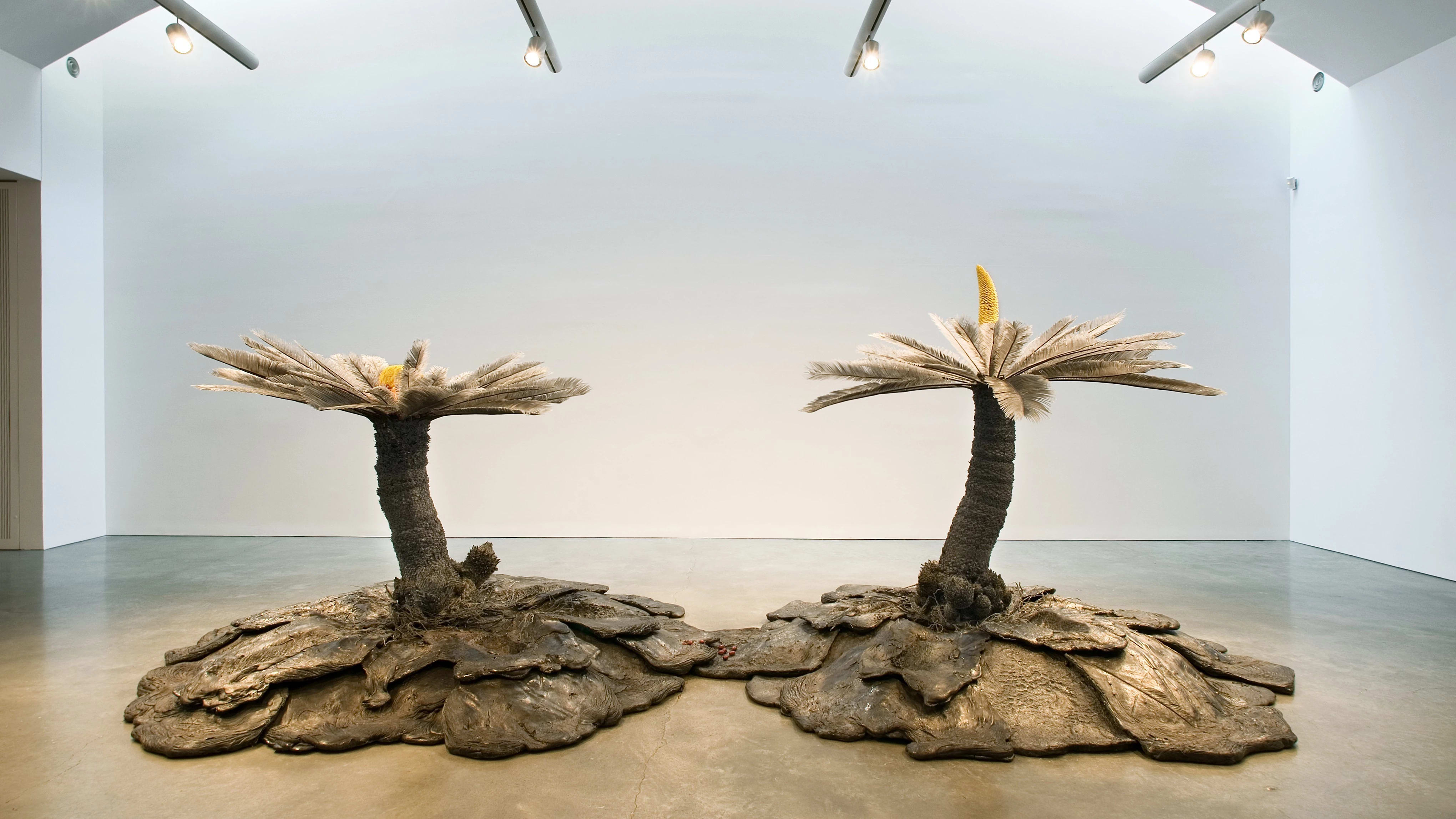 Keith Edmier, Cycas Orogeny, 2003-2004 basalt, polyurethane, acrylic paint, and Cycas revoluta pollen. 88 1/2 x 247 3/4 x 123 1/4 inches.