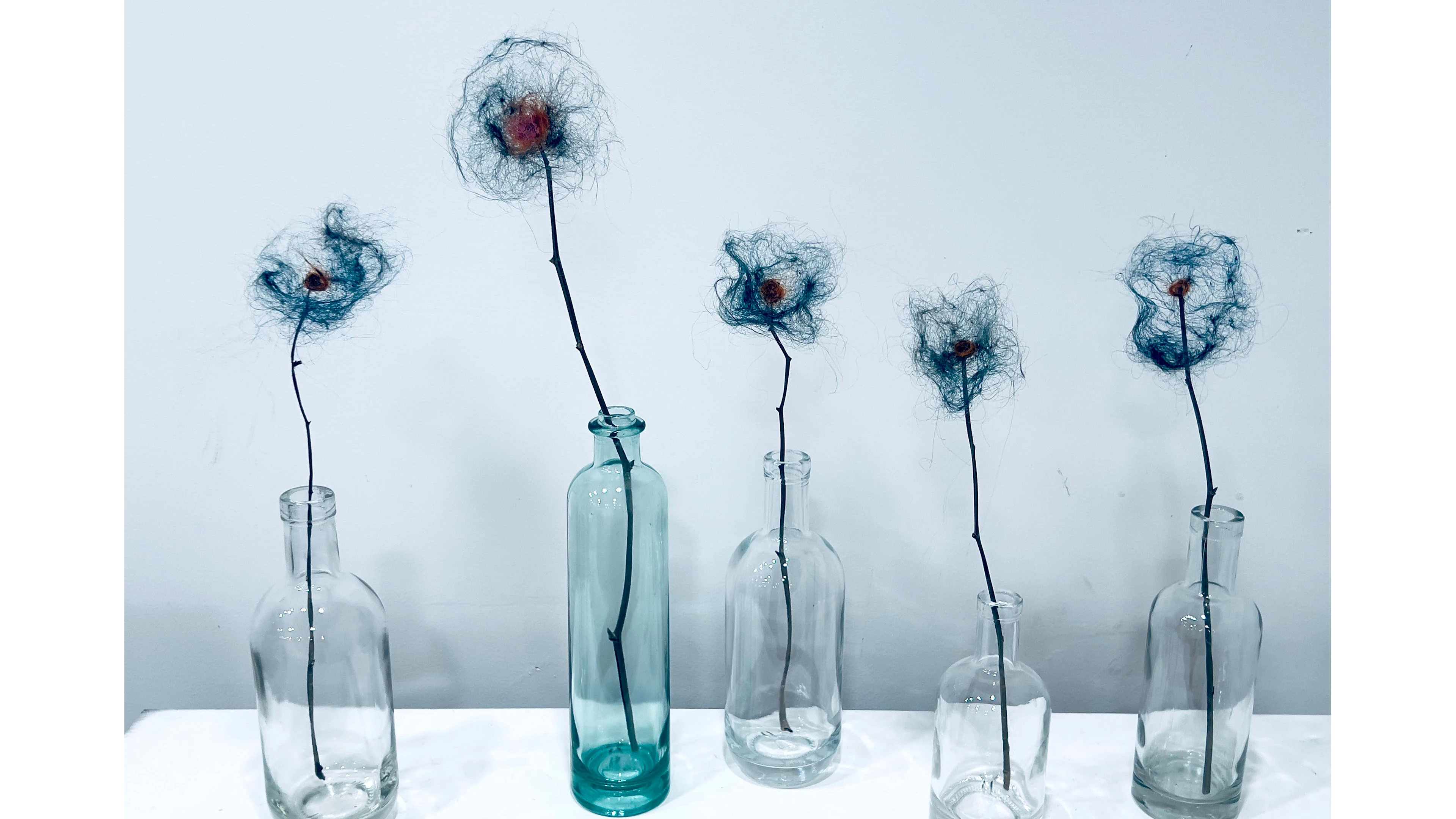 Jay Jansen, WHY BLUE?, 2023, Artist’s Hair, Hair Dye, Wood, Glass, 20” x 18” x 6”