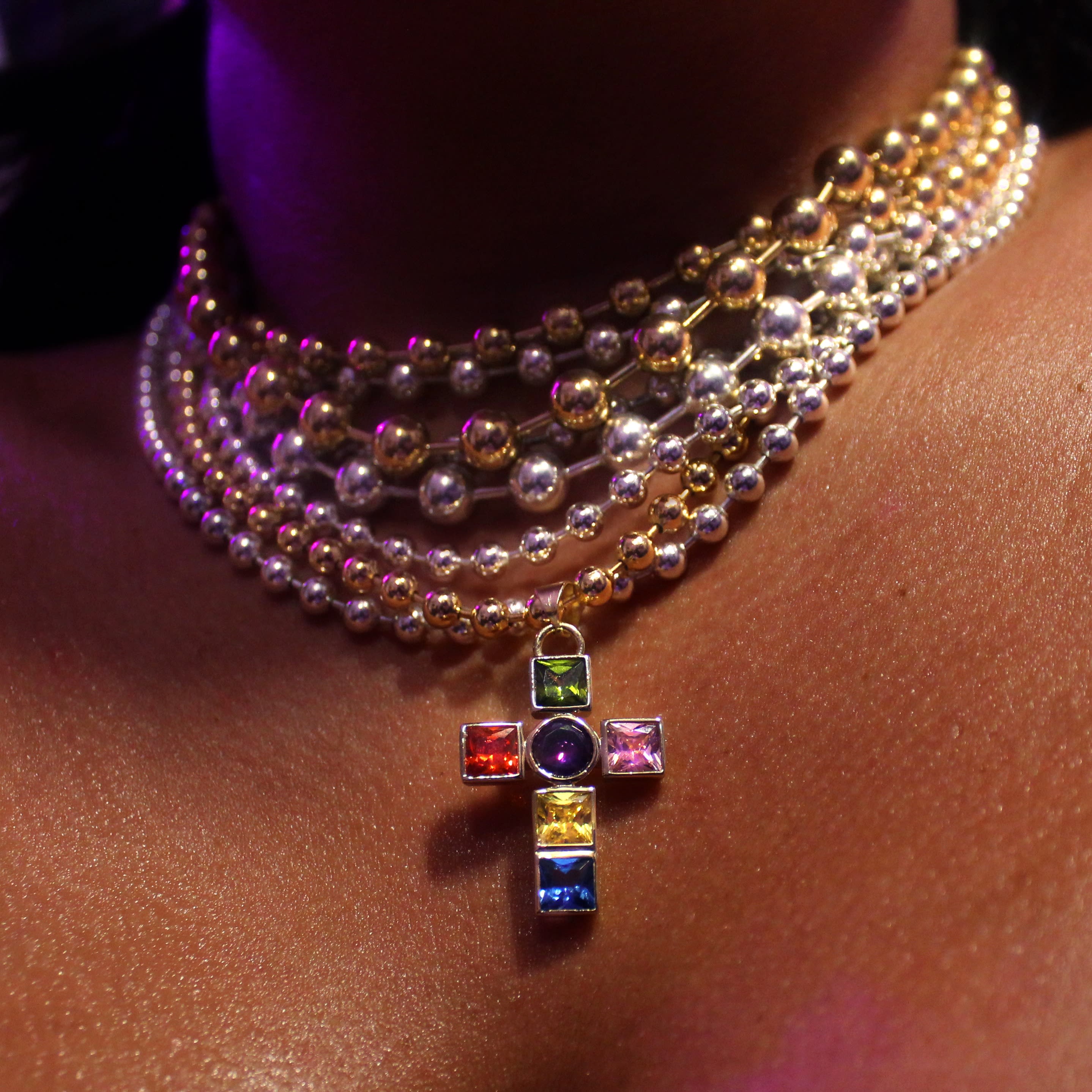 A ball chain cross necklace made by Shami