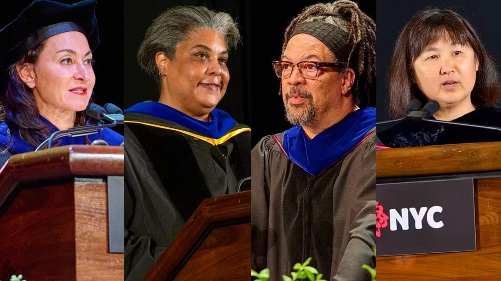 Four graduate speakers in caps and gowns stand at podiums during a graduation ceremony, celebrating their academic achievements.