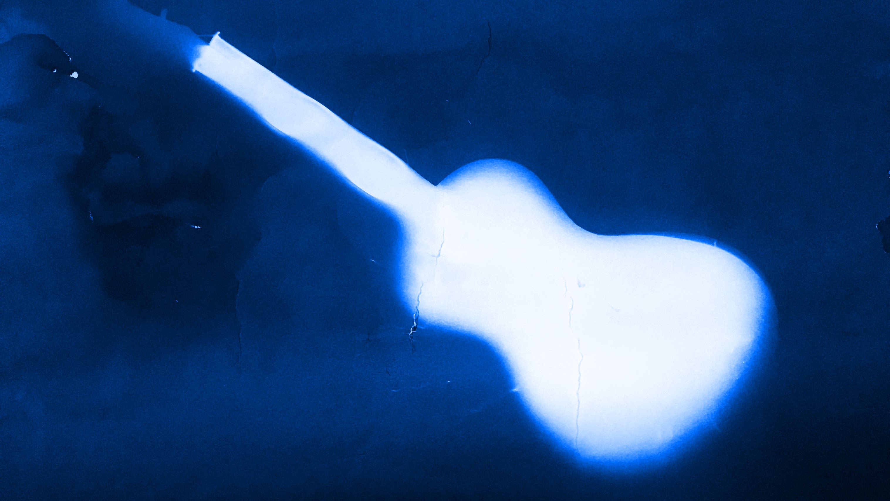light exposure in the shape of a guitar