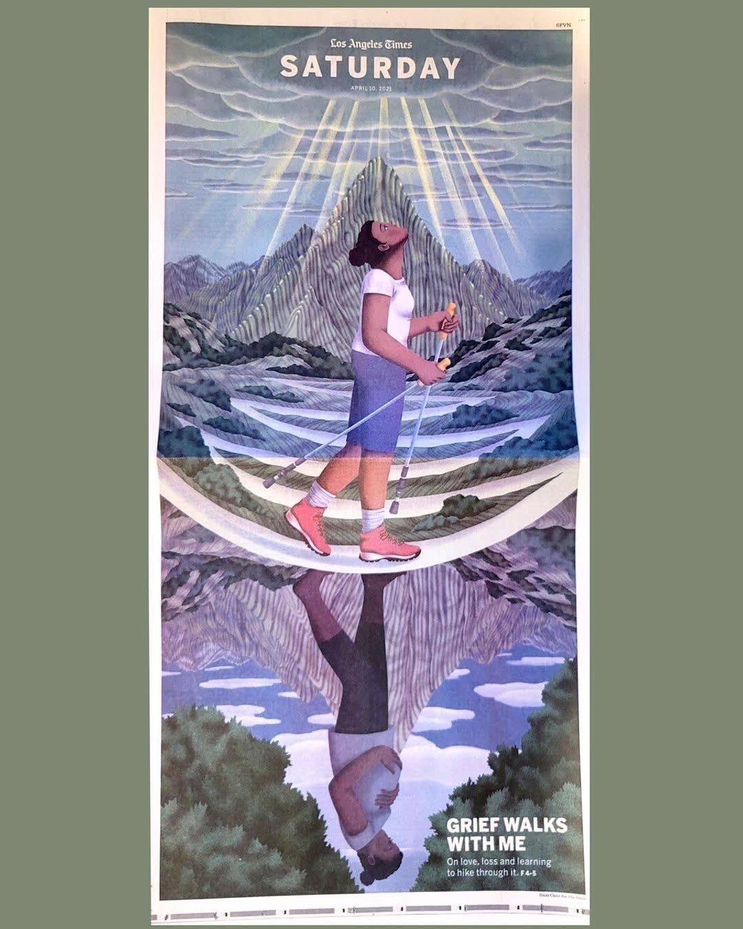 Illustration by Dani Choi taking up a whole page of the LA Times Saturday newspaper. A person walks with a mountain behind them, looking up at a cloudy sky that has rays of sunlight sneaking through. There is a reflection of the scene on the bottom half of the page, in which the person is looking solemn.