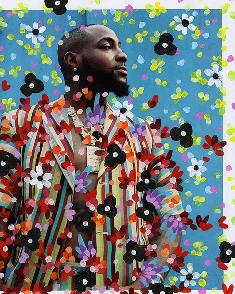 Photo of a man wearing a colorful striped blazer on a blue background, overlaid with colorful painted painted flowers.