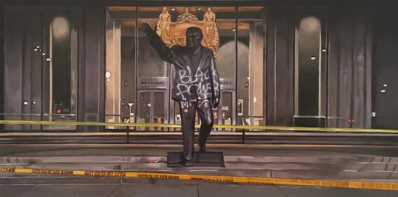 A painting of a bronze statue outside a building that has spray paint on it