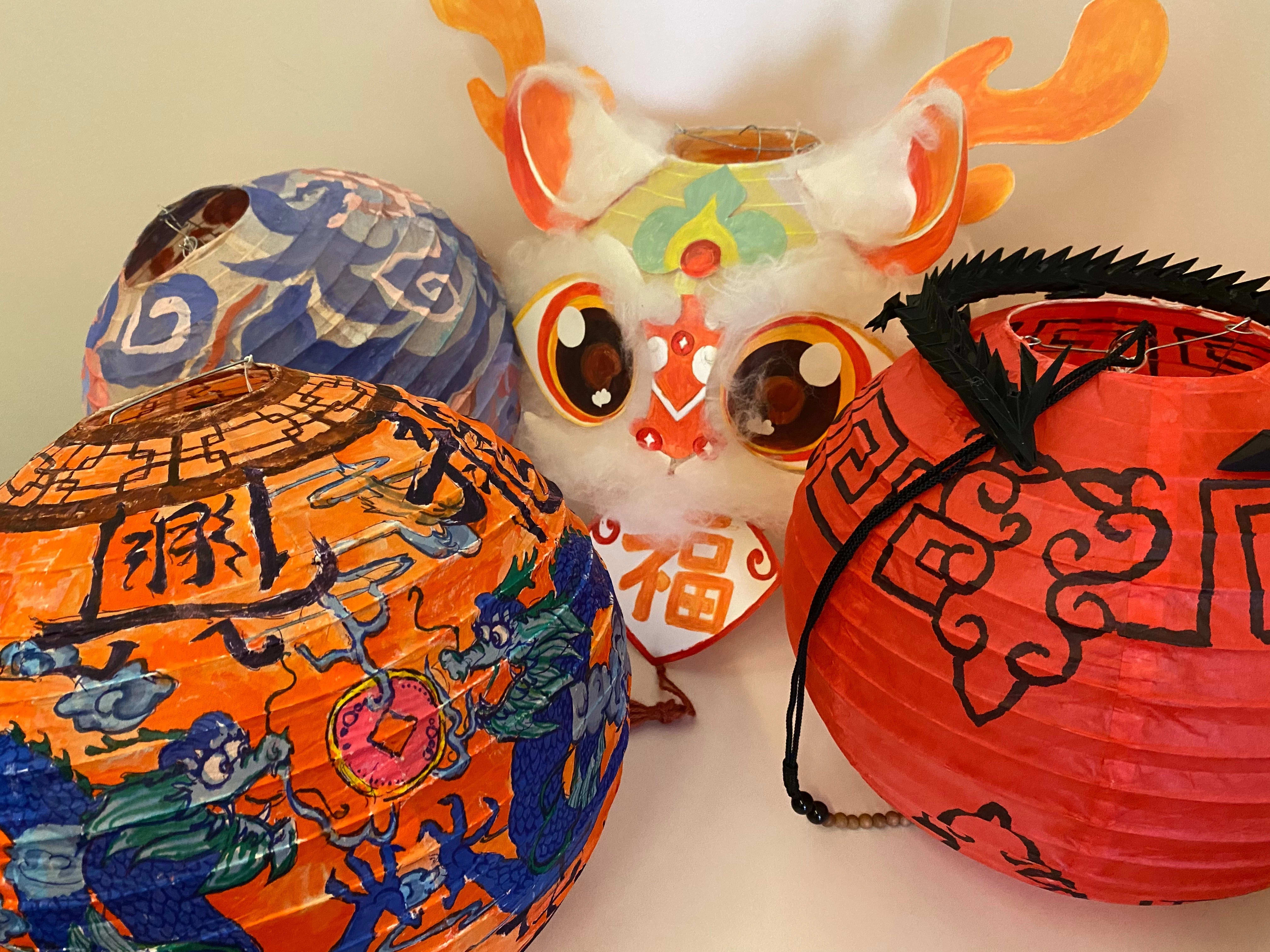 Colorful decorated lanterns on a table 