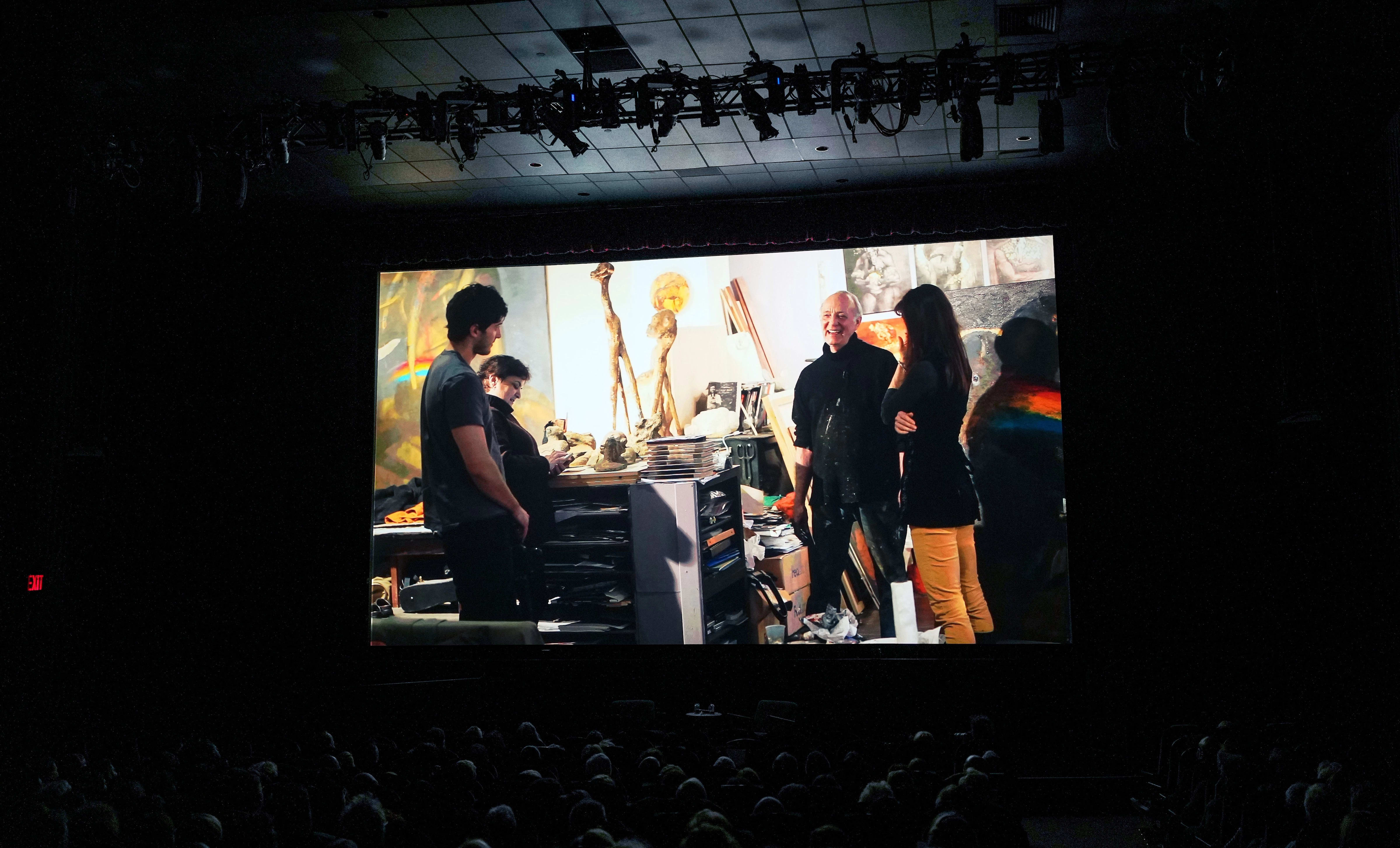 A theatre full of people watching a screening of "Unlocking the Creative Self With Marshall Arisman