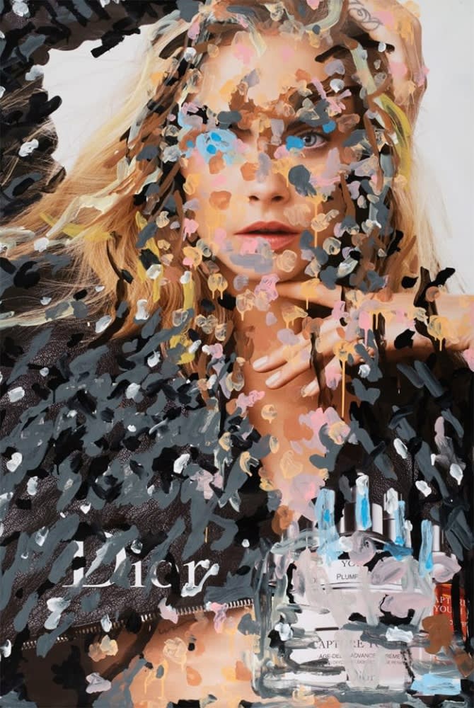 An image of Cara Delevingne covered in various brushstrokes of paint. 