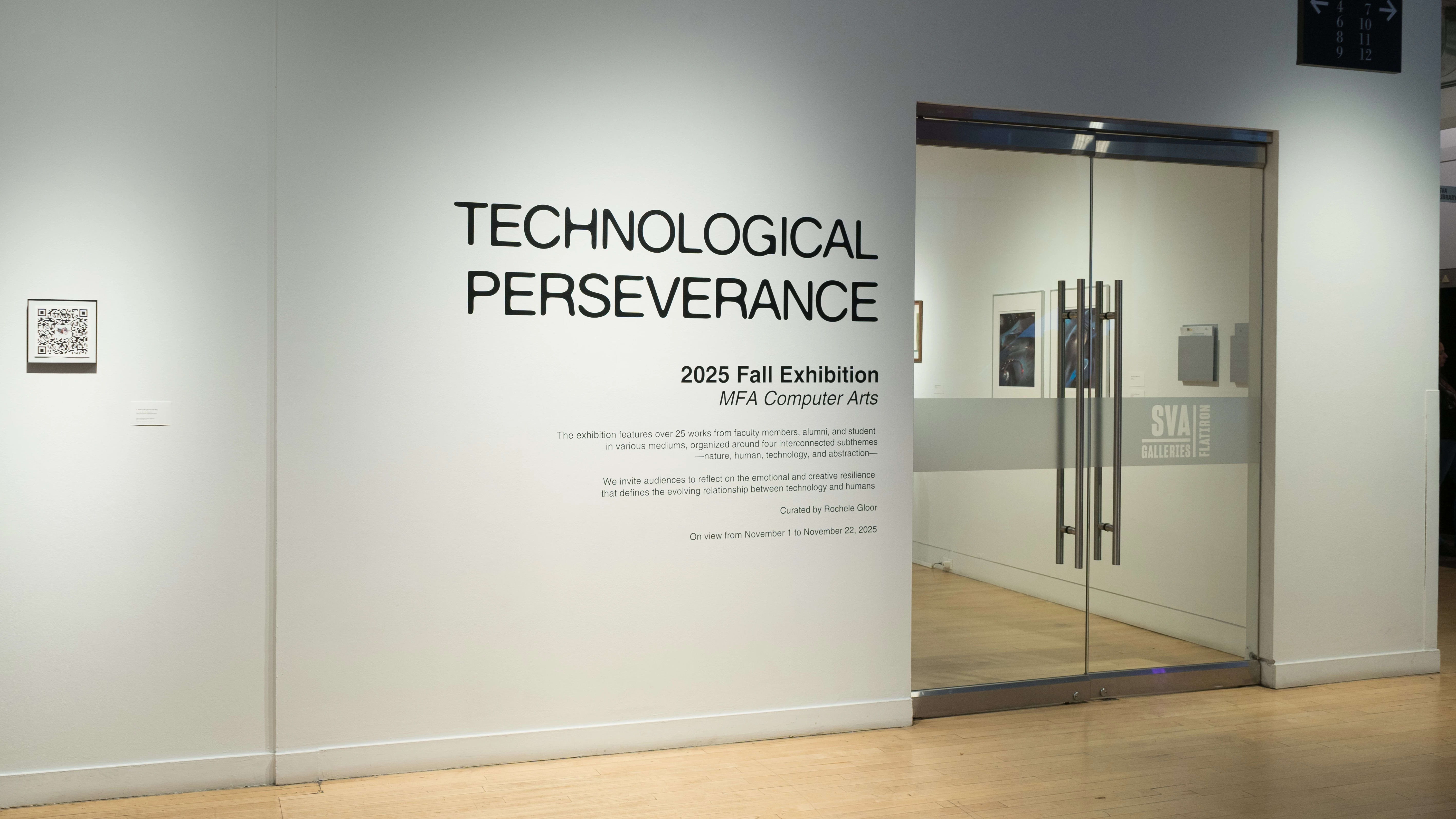 In the gallery alcove, outside of the glass doors, the wall text reads “Technological Perseverance / 2025 Fall Exhibition / MFA Computer Arts.”