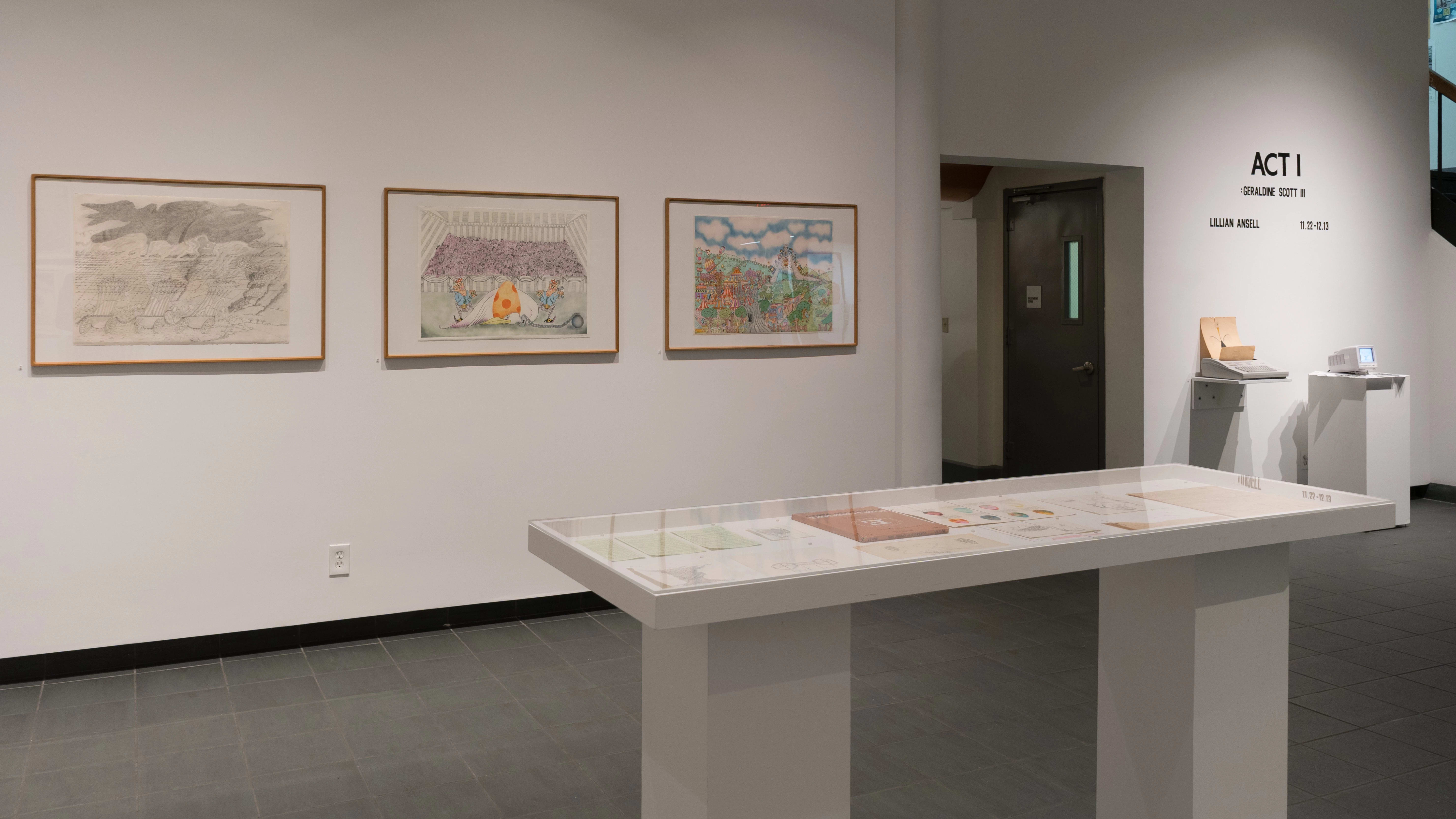 Left of the doorway to the hall, three large illustrations hang beside each other. Right of the doorway, wall vinyl reads “Act I: Garaldine Scott III” above shelves holding a typewriter and a miniature computer screen. A vitrine, in front of the walls, holds loose papers.
