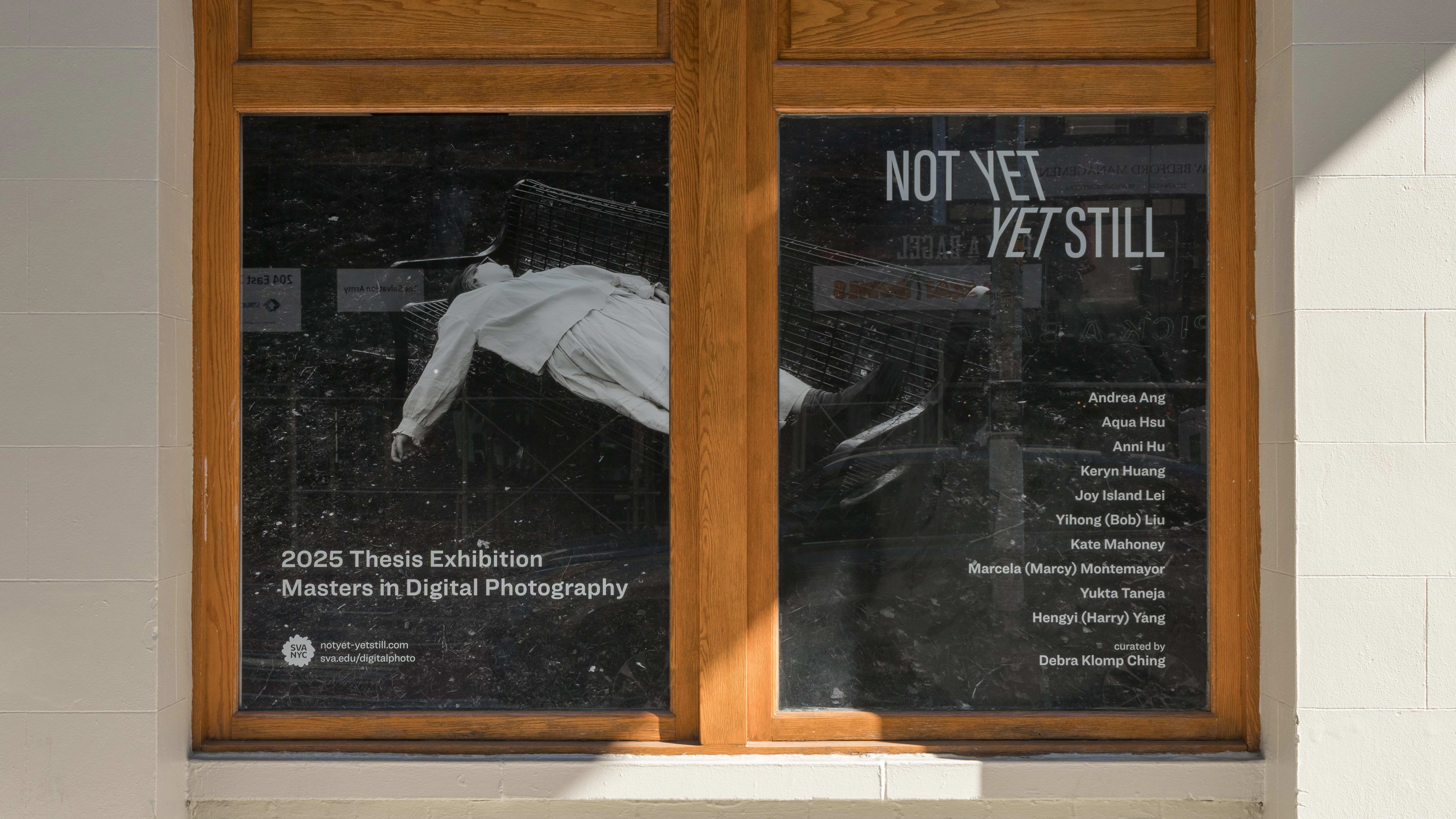 The exterior window of SVA’s Gramercy Gallery, with the exhibition title and poster reading the artists’ names.