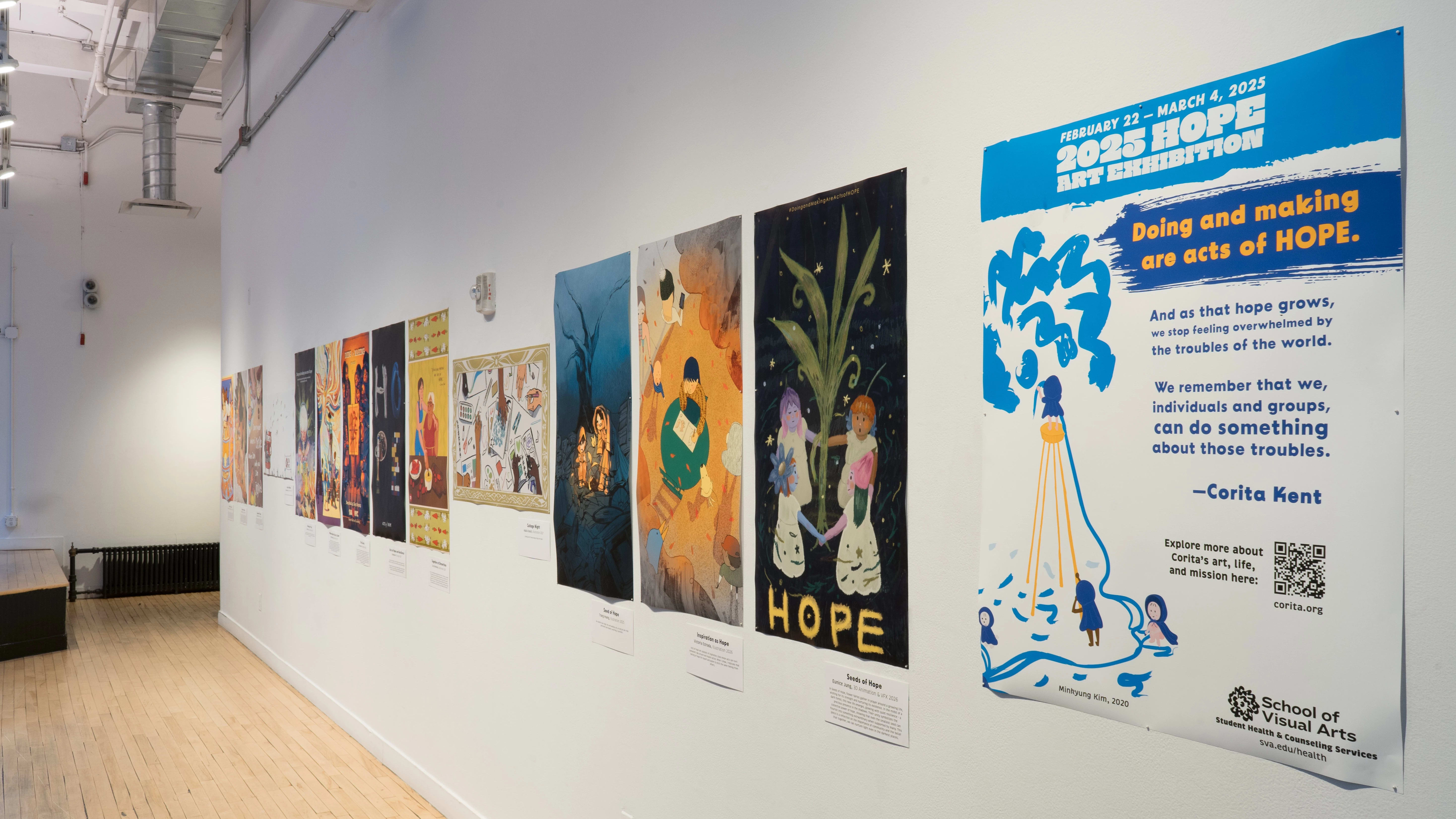 Image of the window hallway of the SVA Flatiron Gallery, facing west, showing many colorful posters.