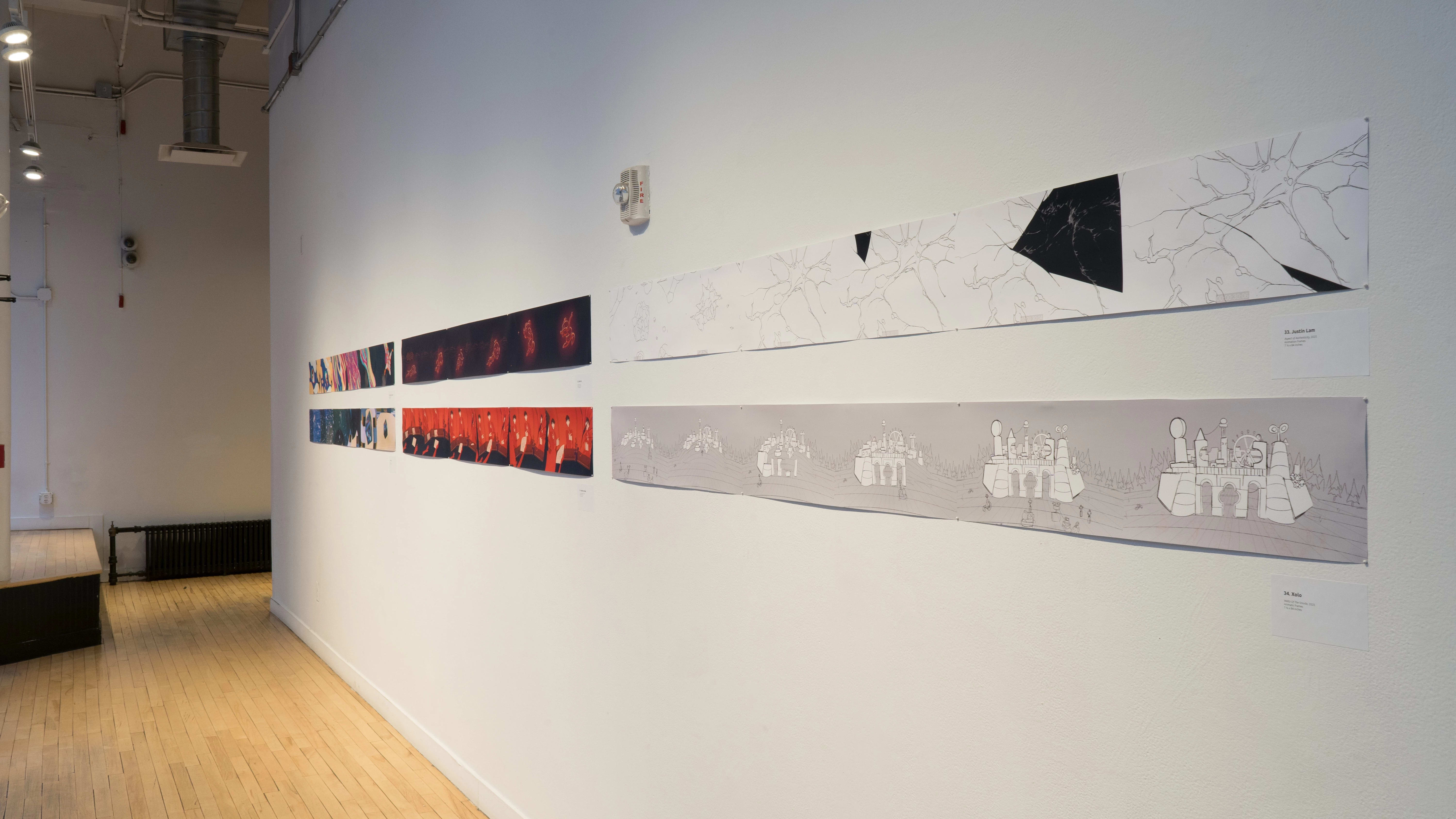 An angled shot of the SVA Flatiron Gallery Windows looking west, showing many colorful prints by BFA Animation students pinned up.