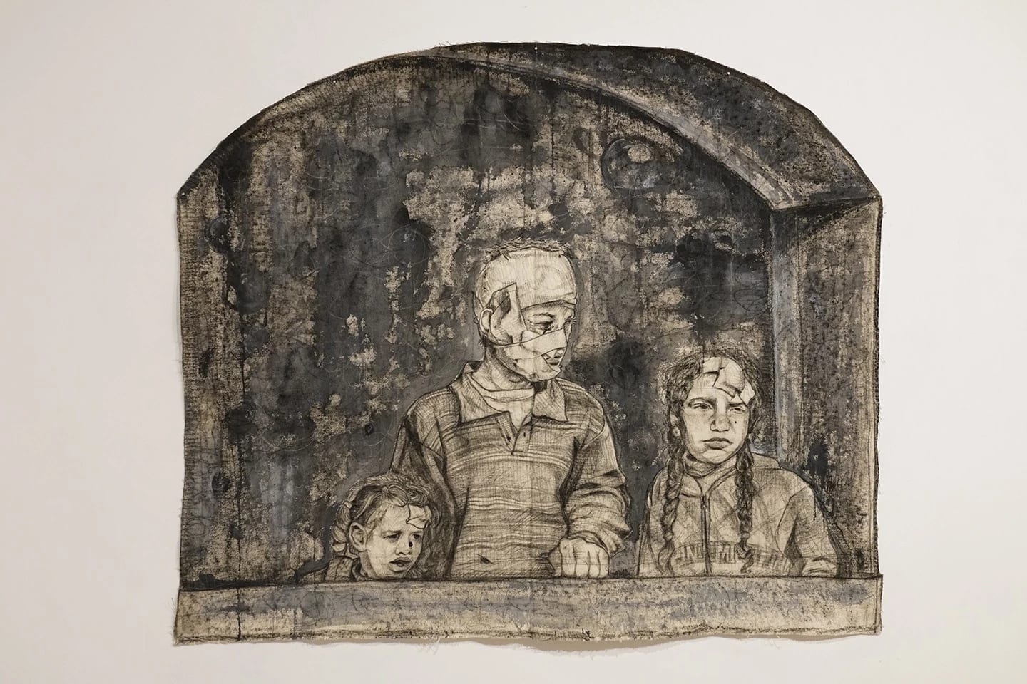 Pencil and charcoal drawing on paper of three children looking out a window. The young boy in the middle has bandages all over his face.