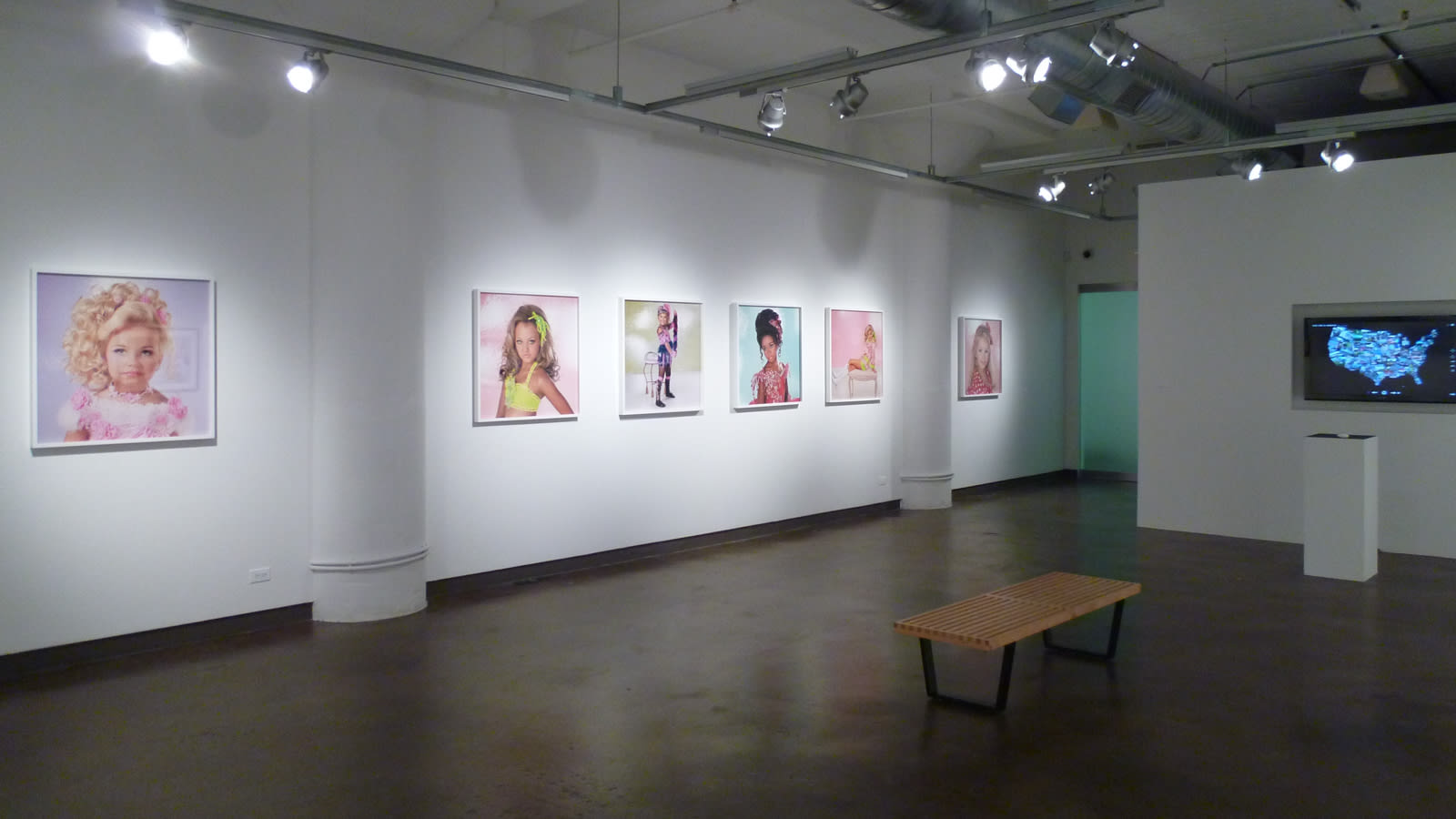 "Being American" gallery exhibition view of artwork in situ.