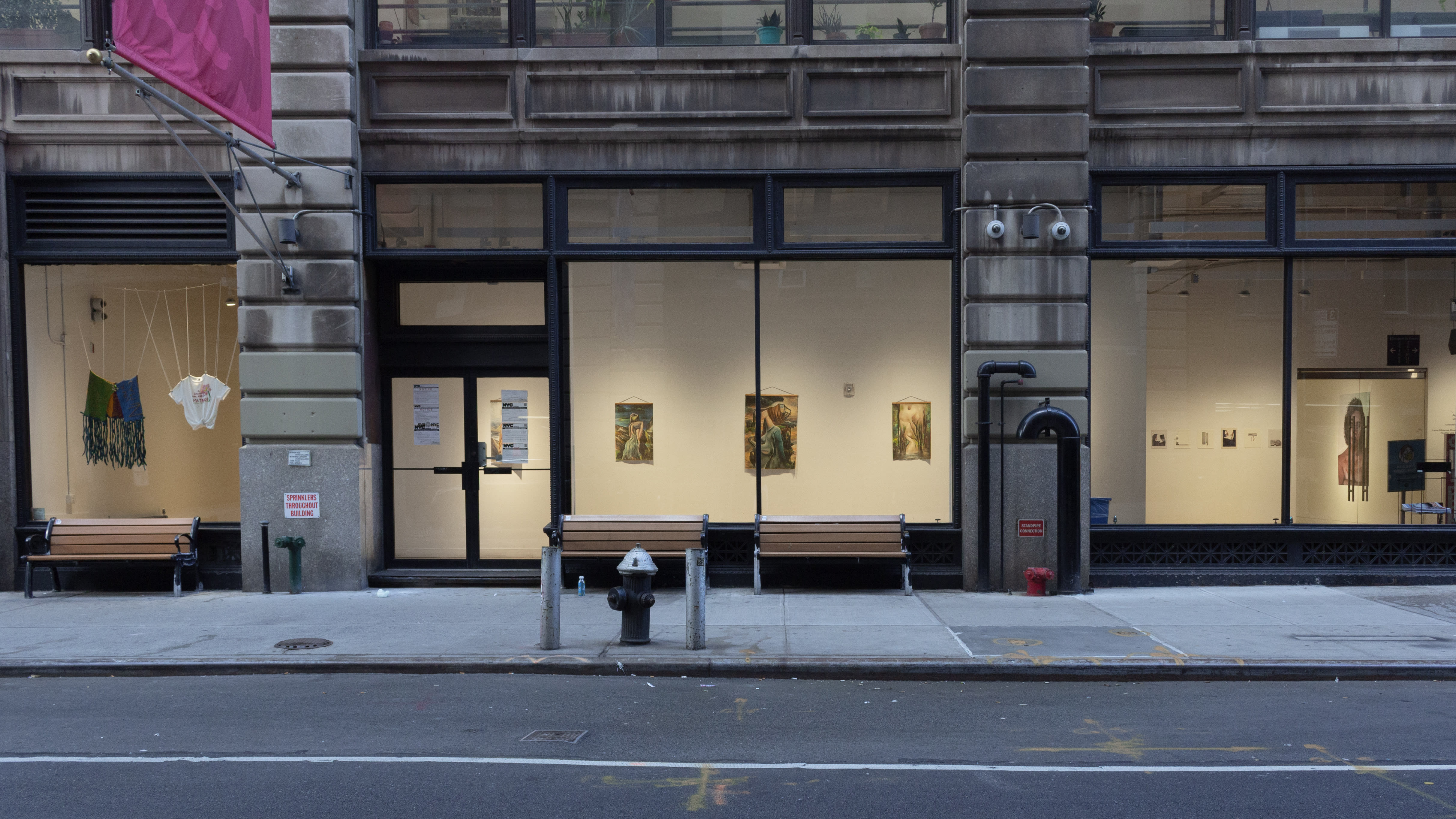 Multiple views of SVA Flatiron Gallery and Windows with installation, photographs, and textile throughout the gallery.