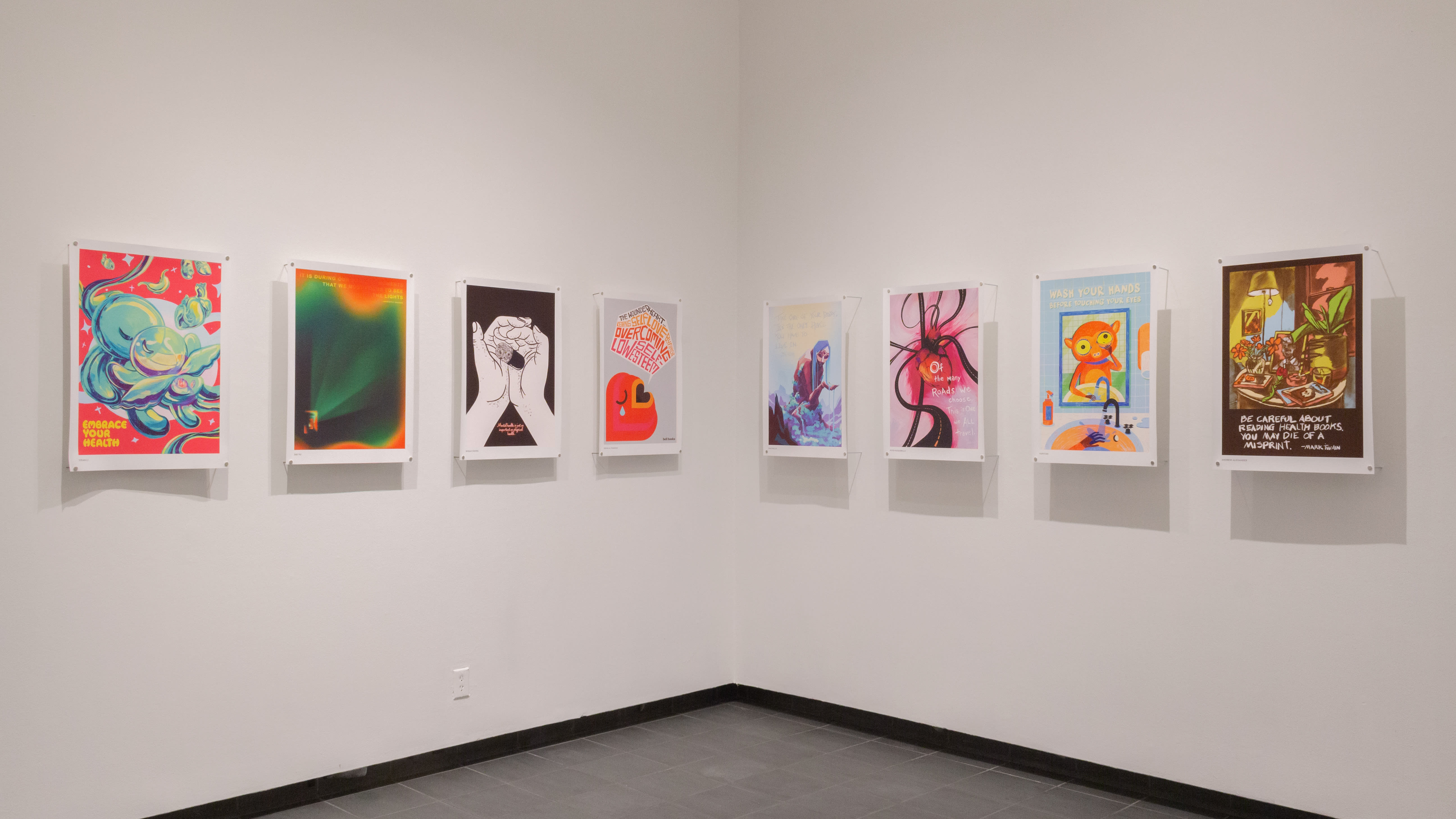 Multiple views of SVA Gramercy Gallery. Posters with illustrations are hung on the walls.