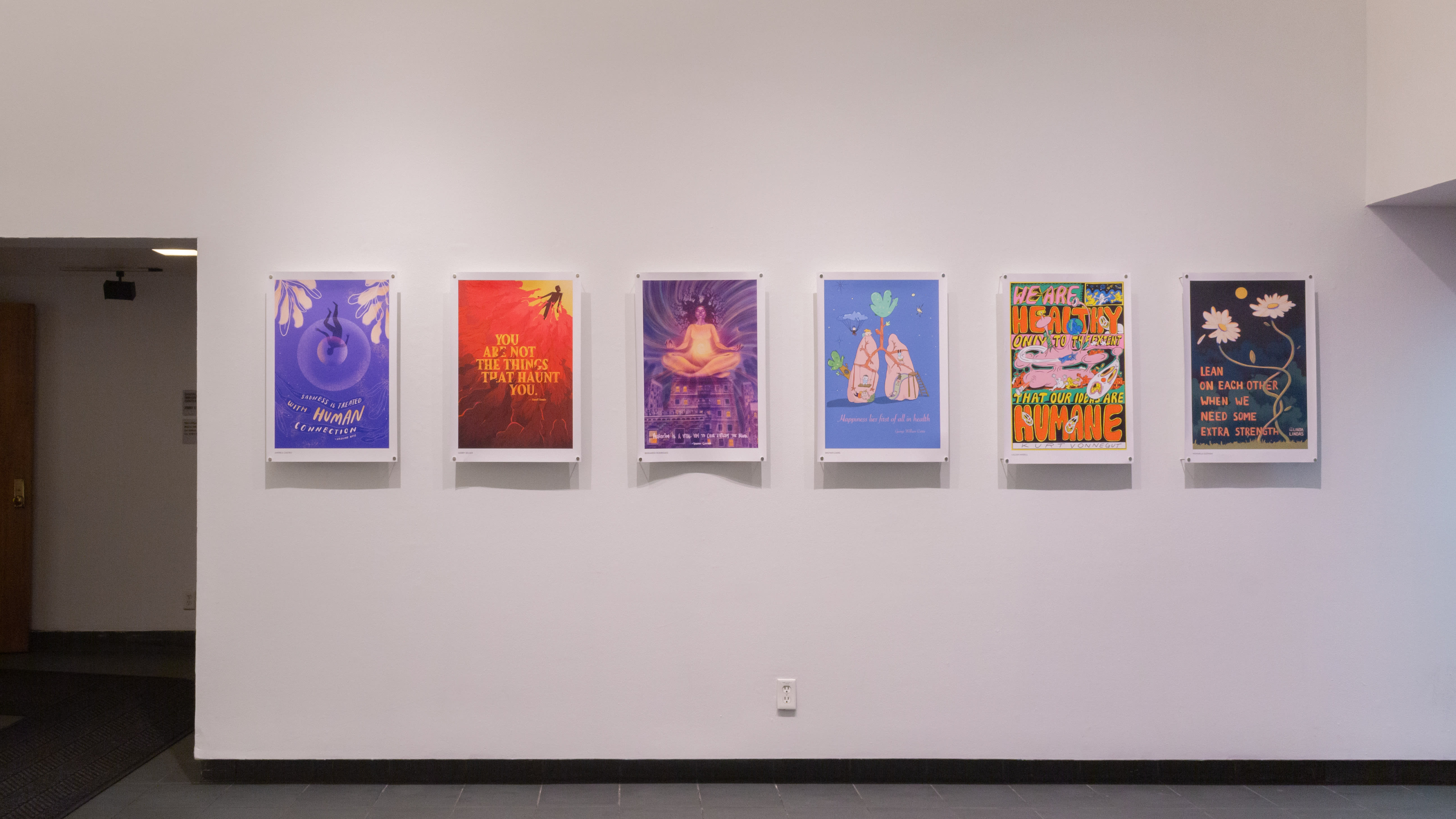 Multiple views of SVA Gramercy Gallery. Posters with illustrations are hung on the walls.