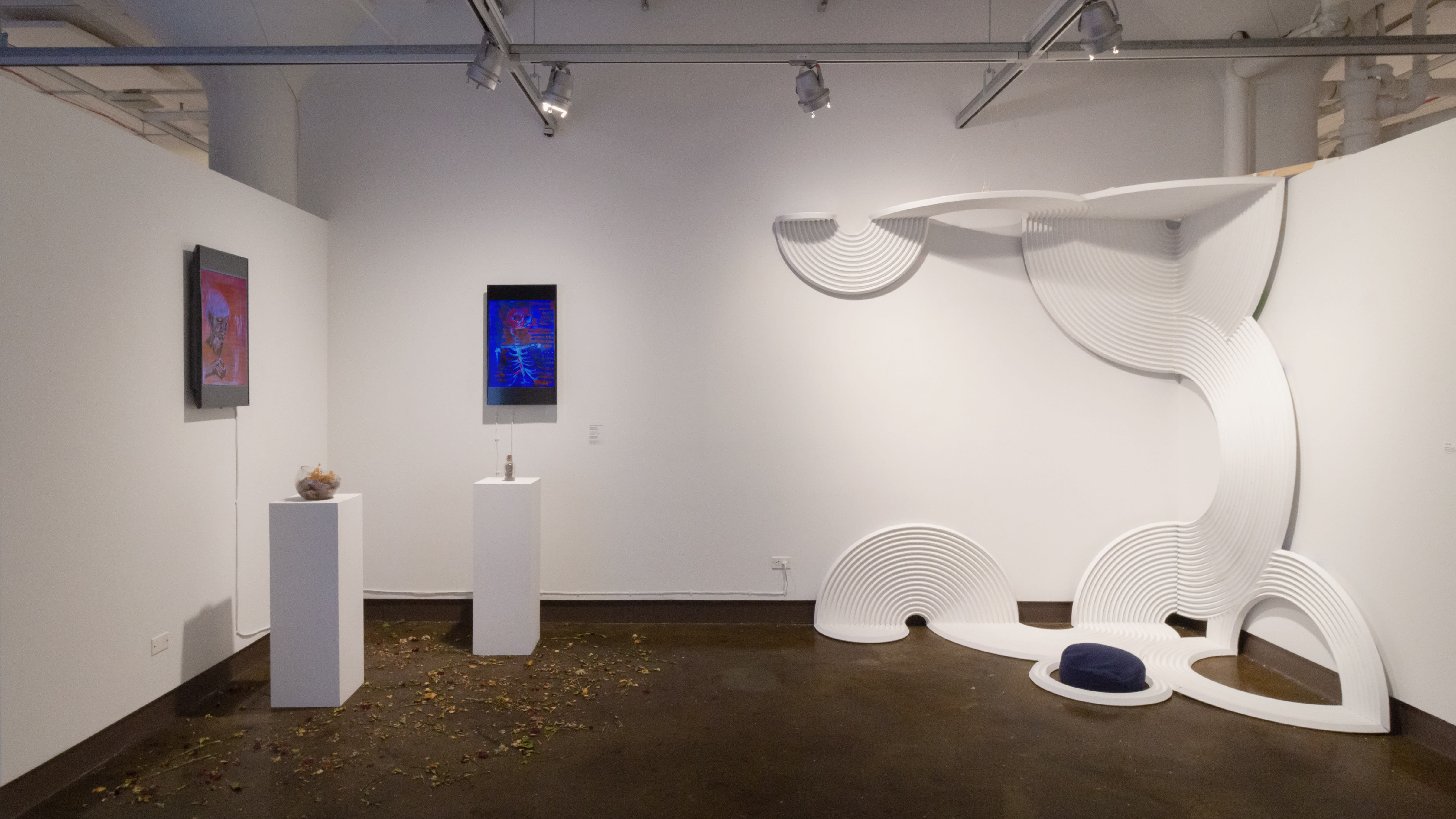Multiple views of SVA Chelsea Gallery with sculpture, painting, installation and video.