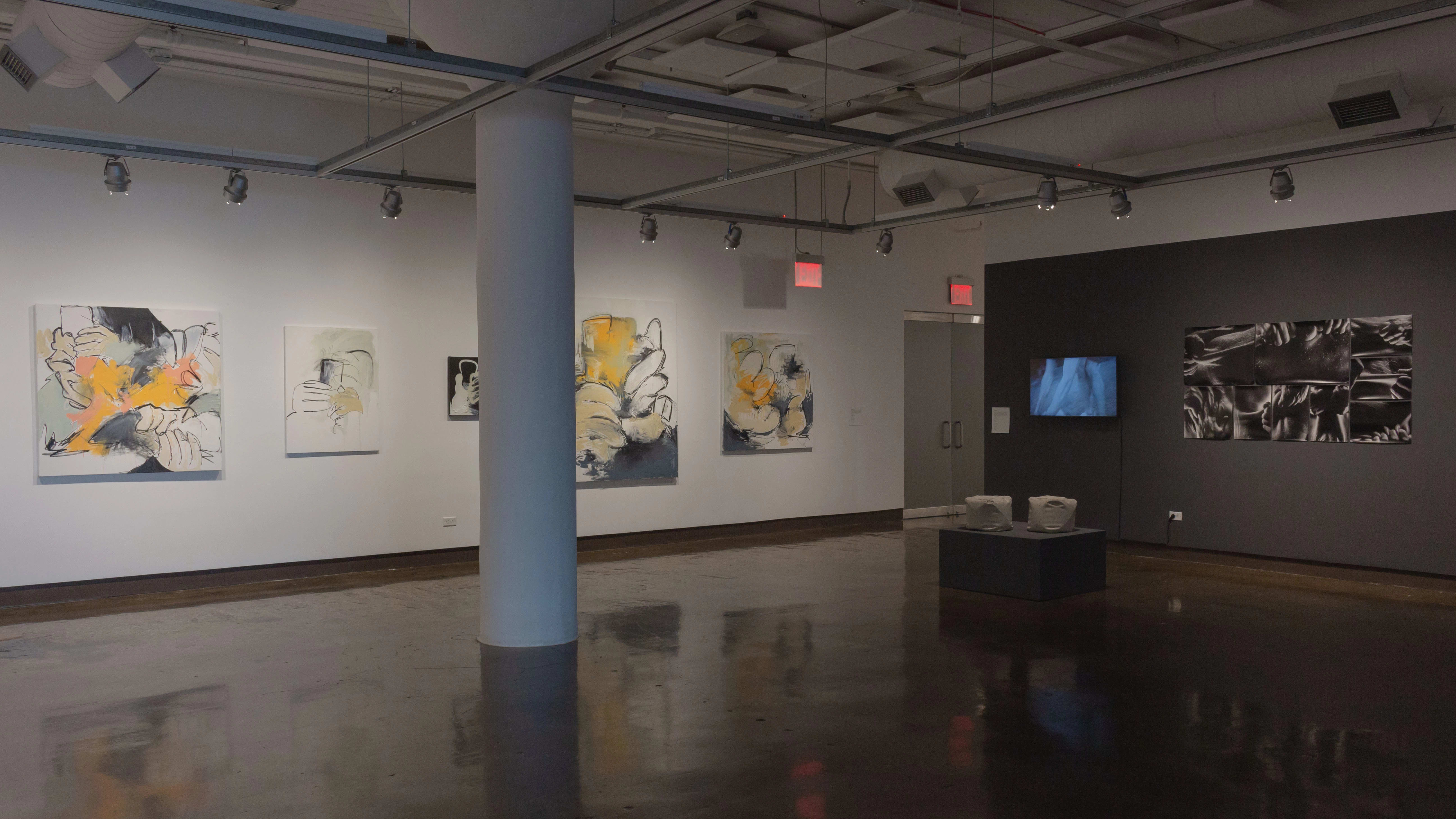 Multiple views of SVA Chelsea Gallery with framed and unframed photographs, video, and installation with projectors. 