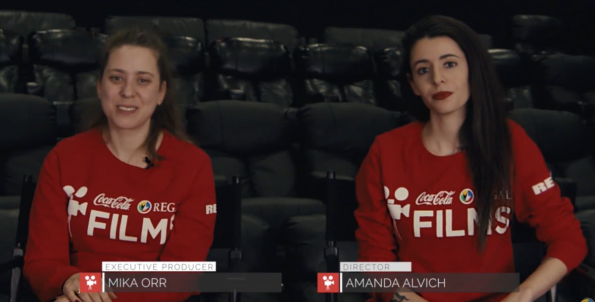 Two women talking on camera.