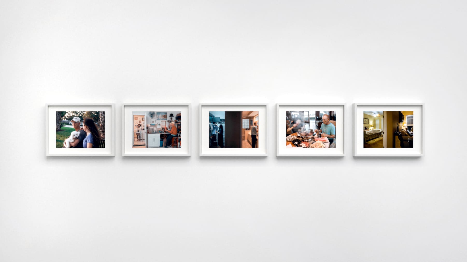 Color photographs in white frames