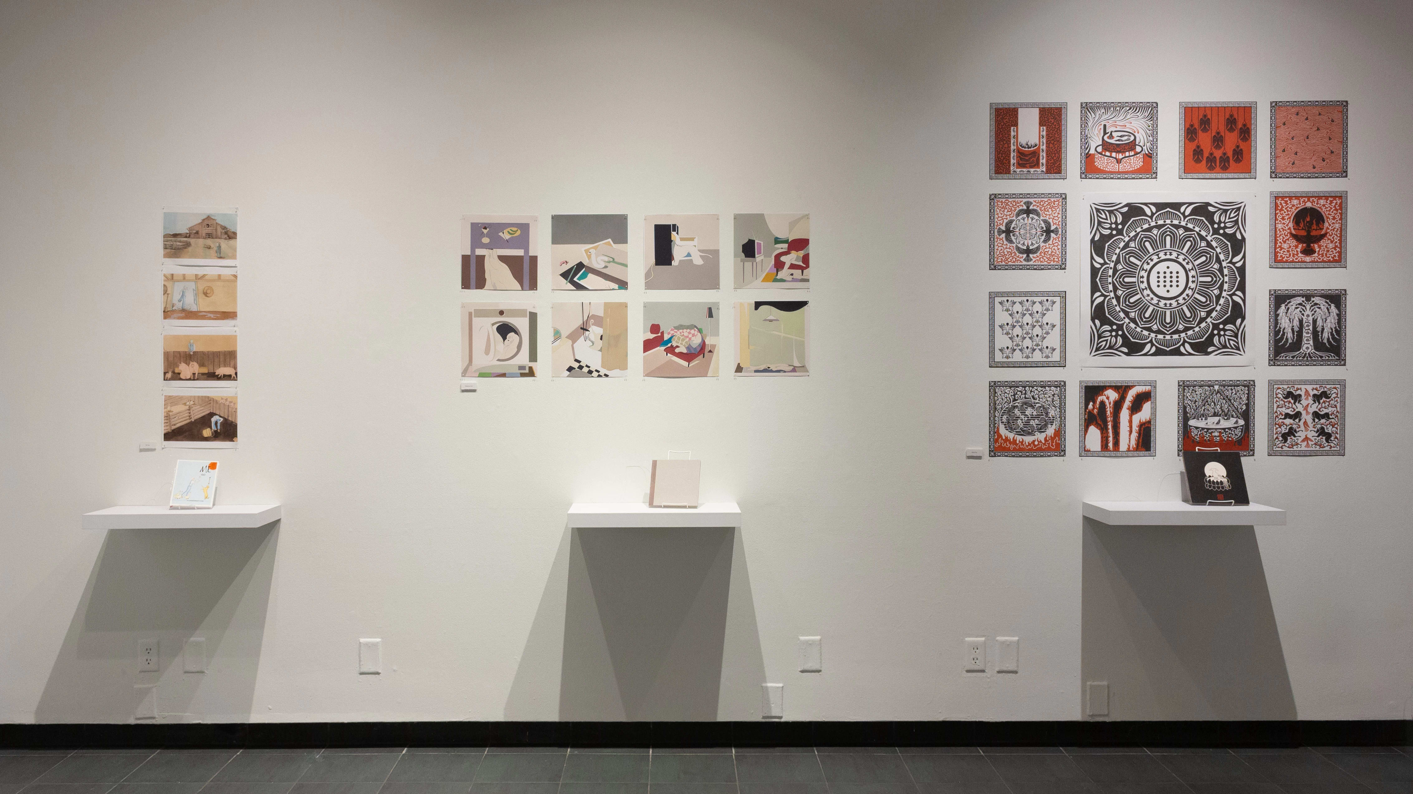 Install image showing a straight view of a gallery wall with three installations of books on shelves with individual pages pinned to the wall.