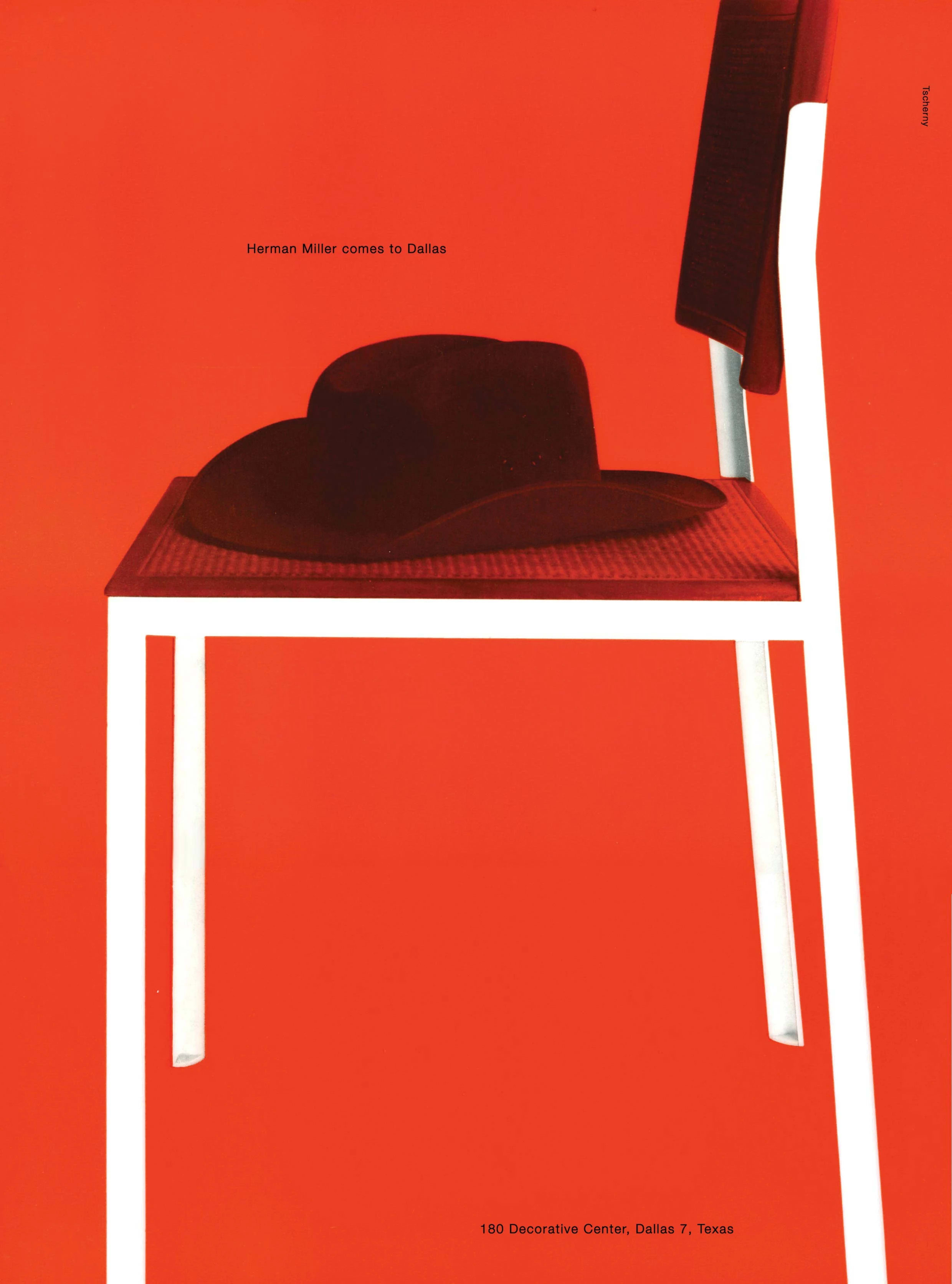 A red poster featuring a black hat on a red and white chair.