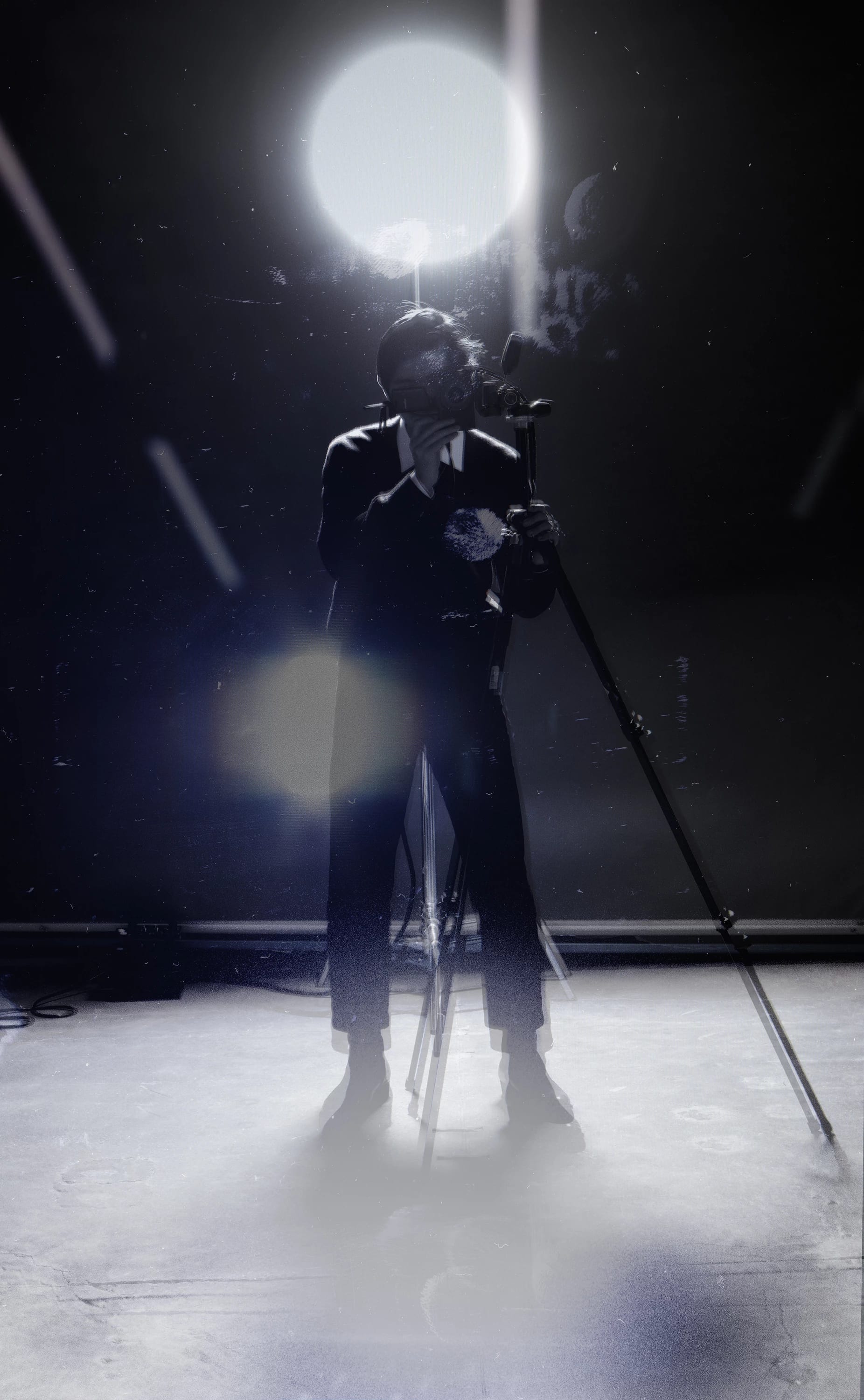 A color photograph of a self portrait taken with a studio flash and a tripod. The figure is looking at us, the viewer. There is another reflection of a flash in the middle of the image, as well as a reflection of a stripe lights that are creating a white mark on the photograph.