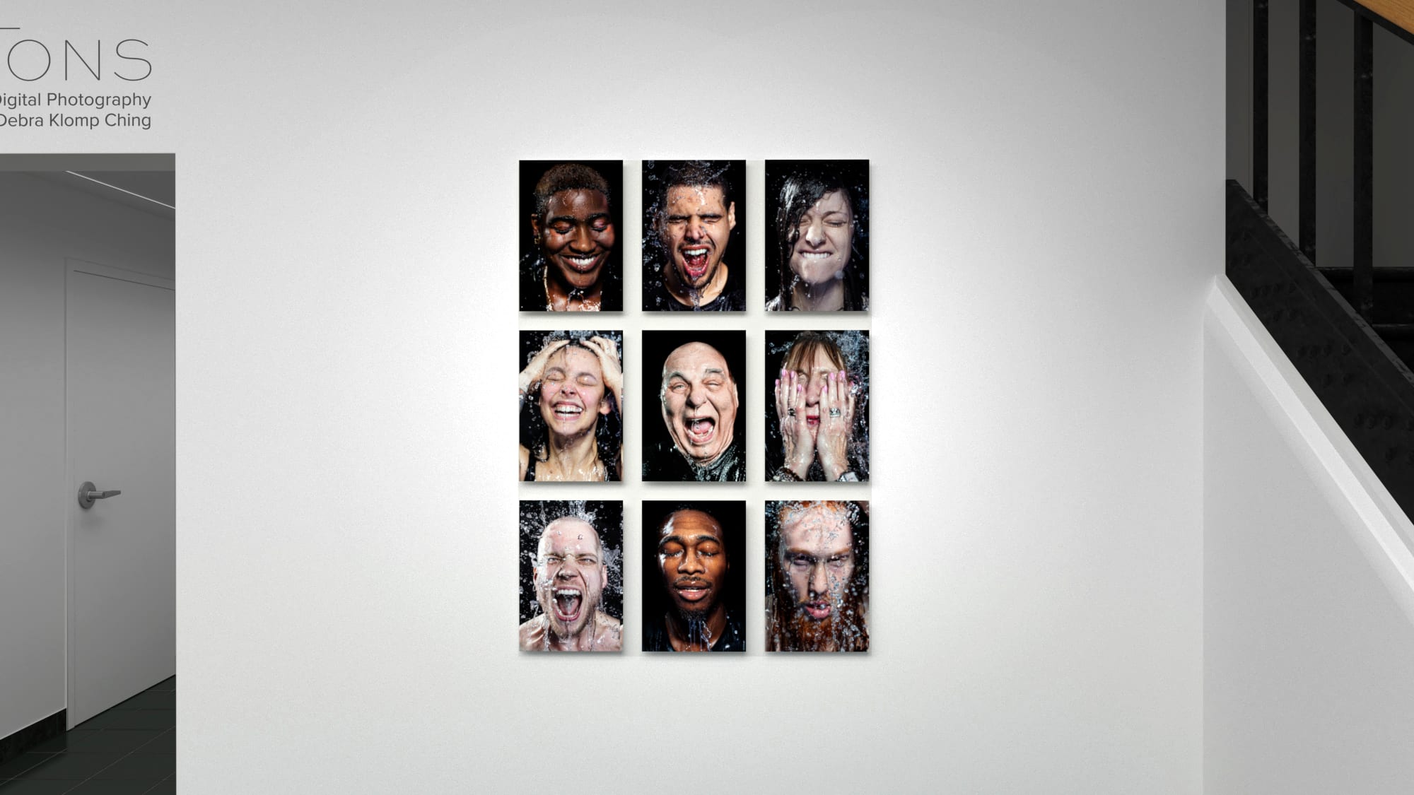 Photograph of nine color prints of people's faces, arranged in a 3 x 3 grid on white wall.