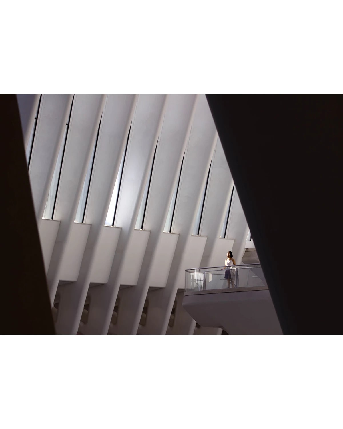 A girl standing alone gazing to the distance