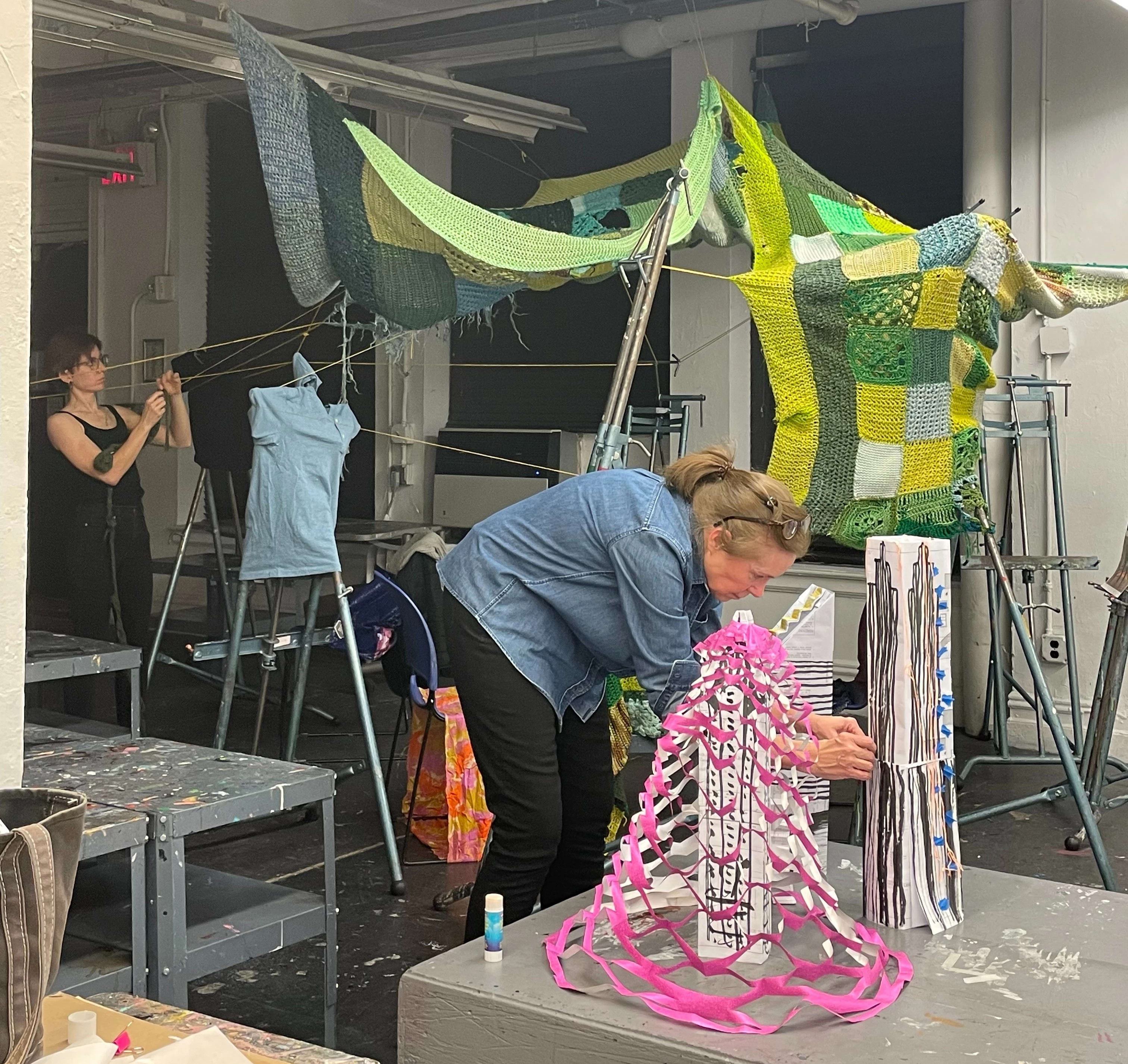 Students working in the classroom in the course Drawing as Social Practice.