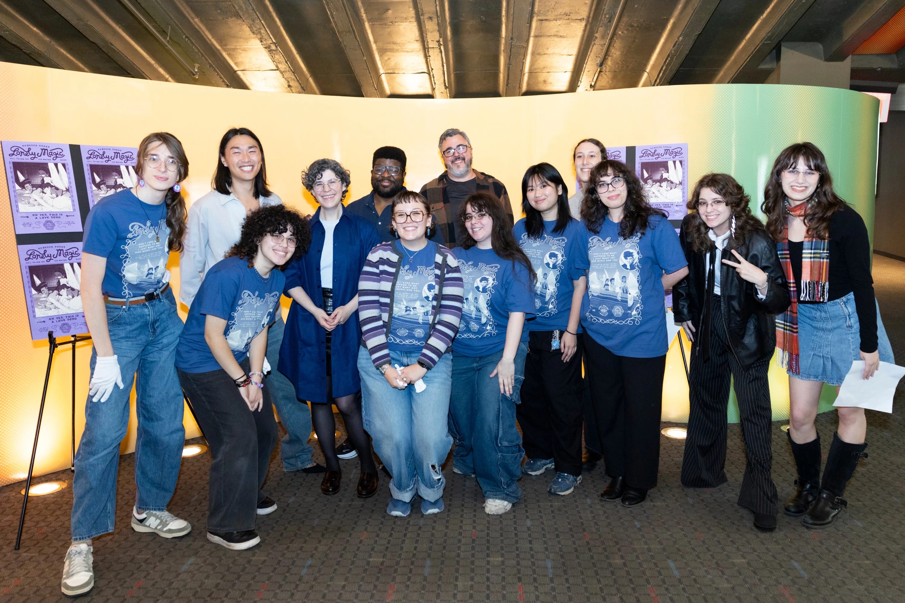 ALT-text: Lonely Magic panelists and students posing for a photograph.