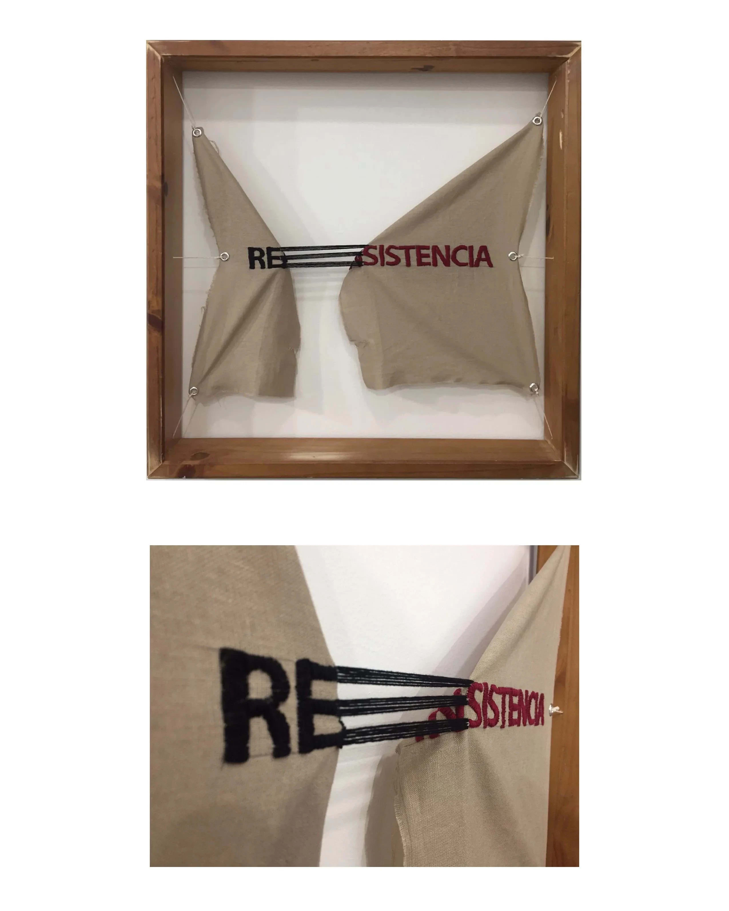 A framed woven art piece with the word "Resistencia" stitched on canvas.