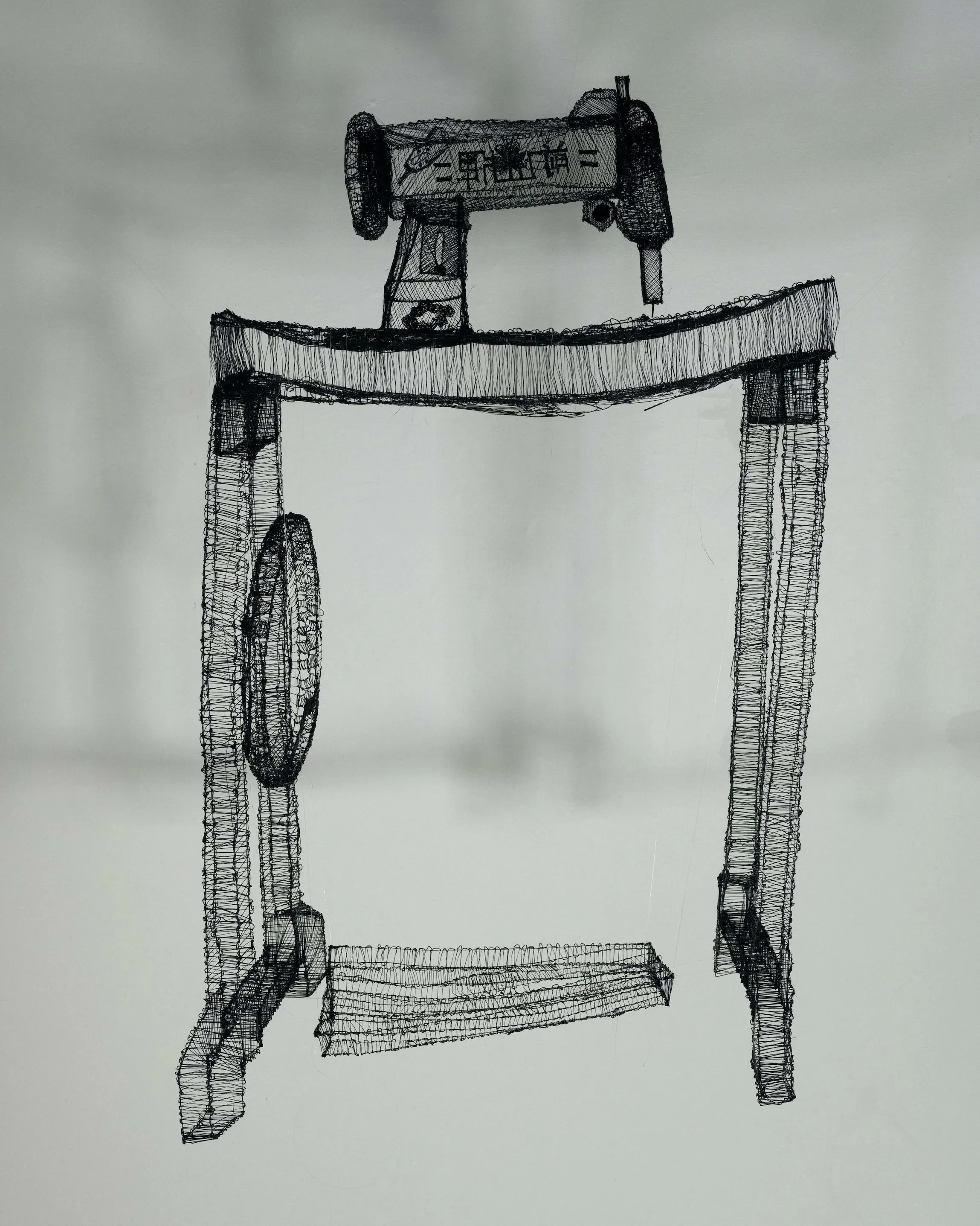 A 3D-printed blacks sewing machine station