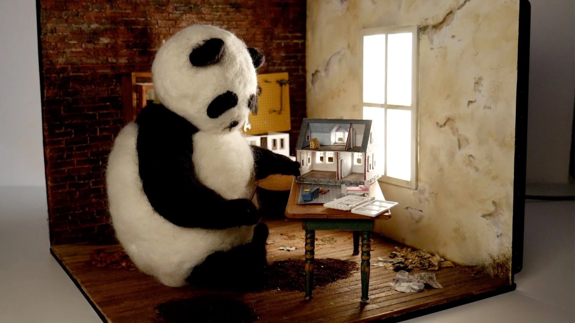panda doll sitting in a house