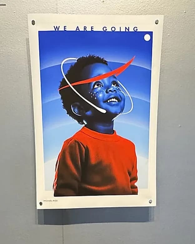 One of the ARTEMIS II posters designed by SVA students on a gray wall.
