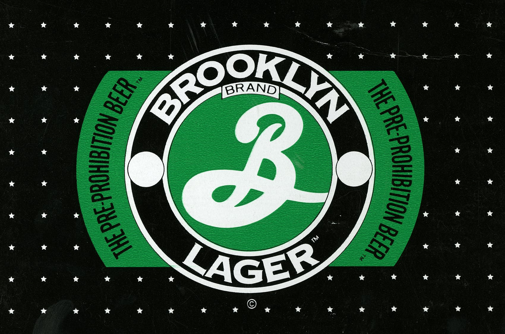 A green, black and white design for the Brooklyn Brewery, with a stylized "B" at its center.
