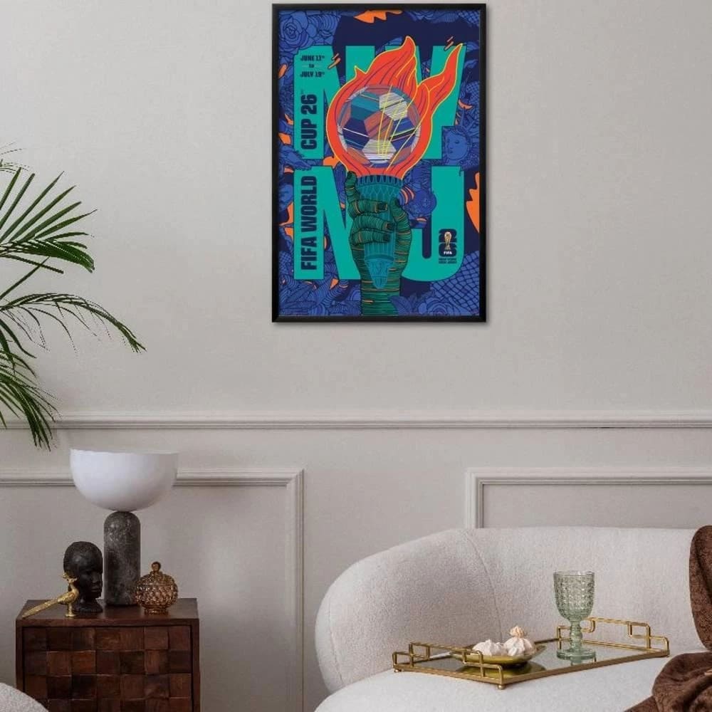 Rich Tu's FIFA 2026 New York New Jersey poster hung up in a frame on the wall of a room.
