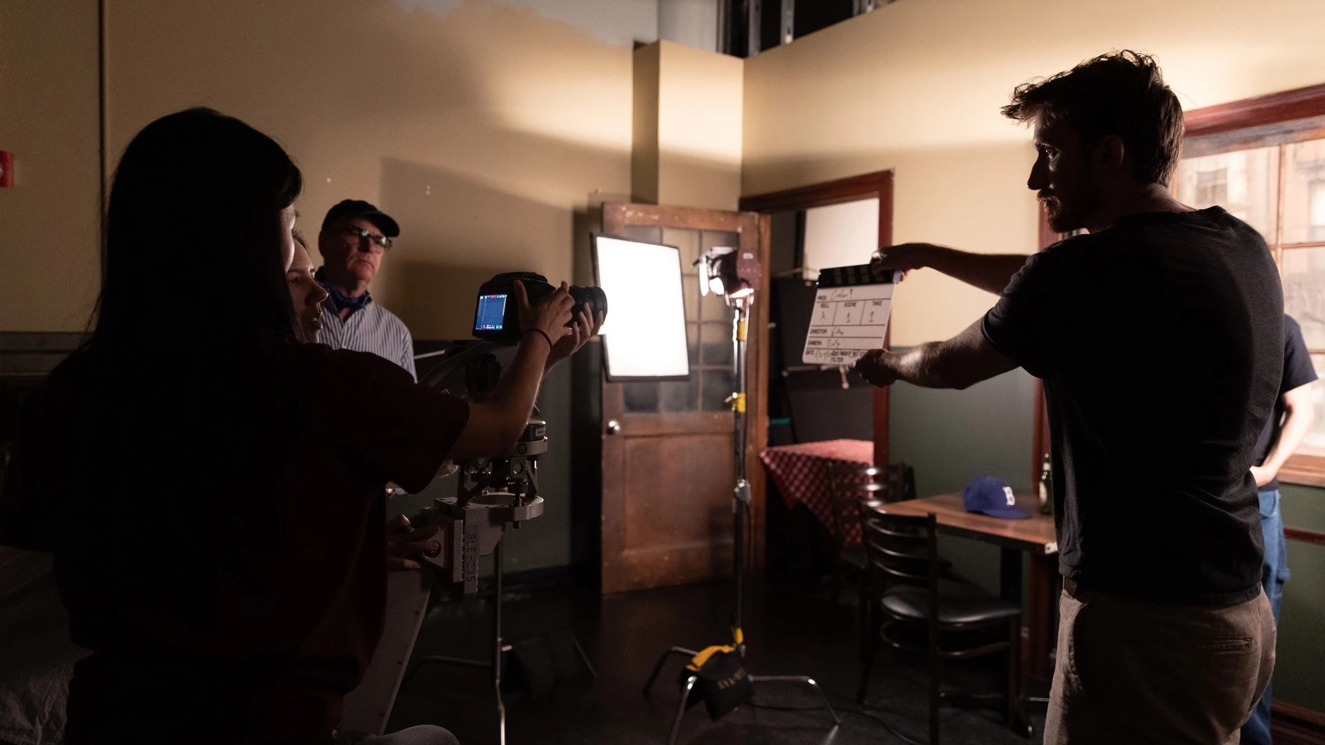 camera operator in a lighting studio