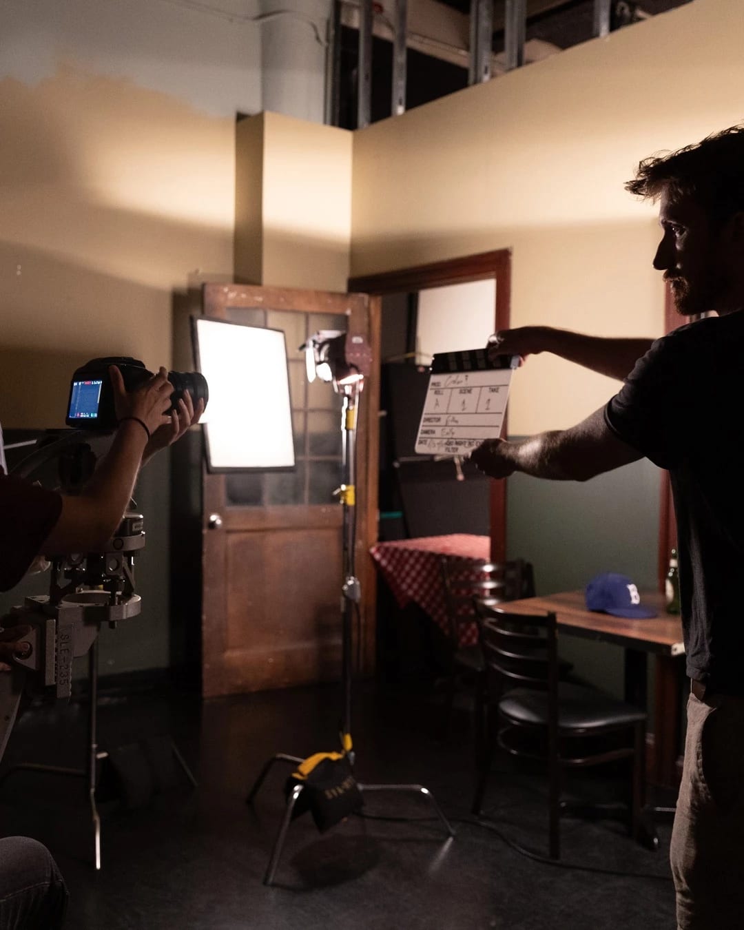 camera operator in a lighting studio