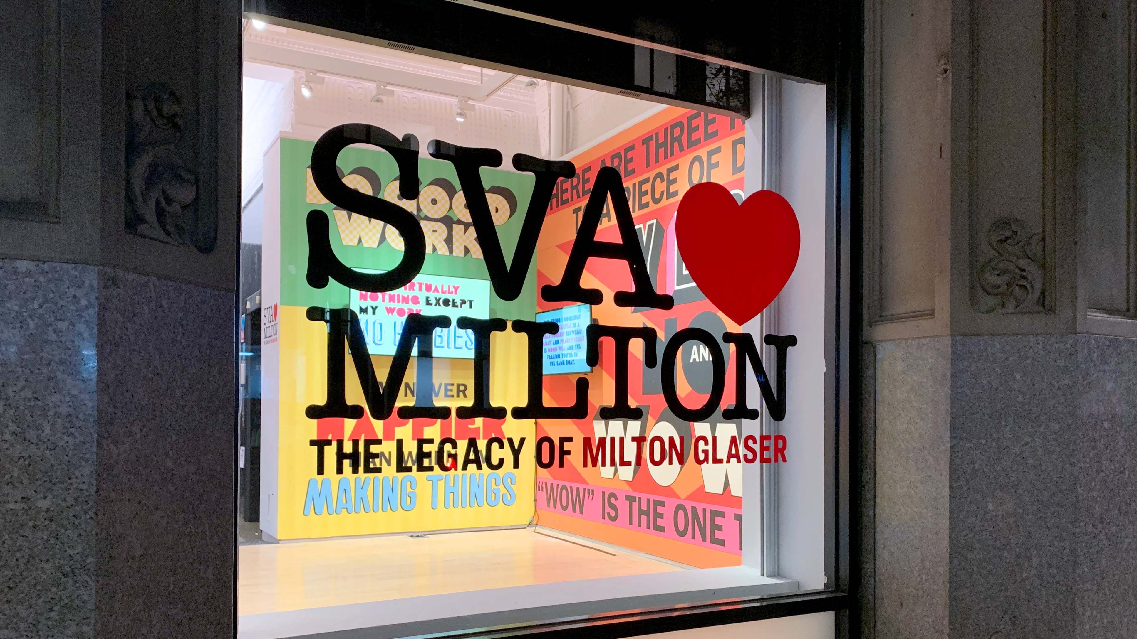 Window lettering stating "SVA Loves Milton," with "Loves" represented by a heart shape, and a boldly rendered text-based installation inside.