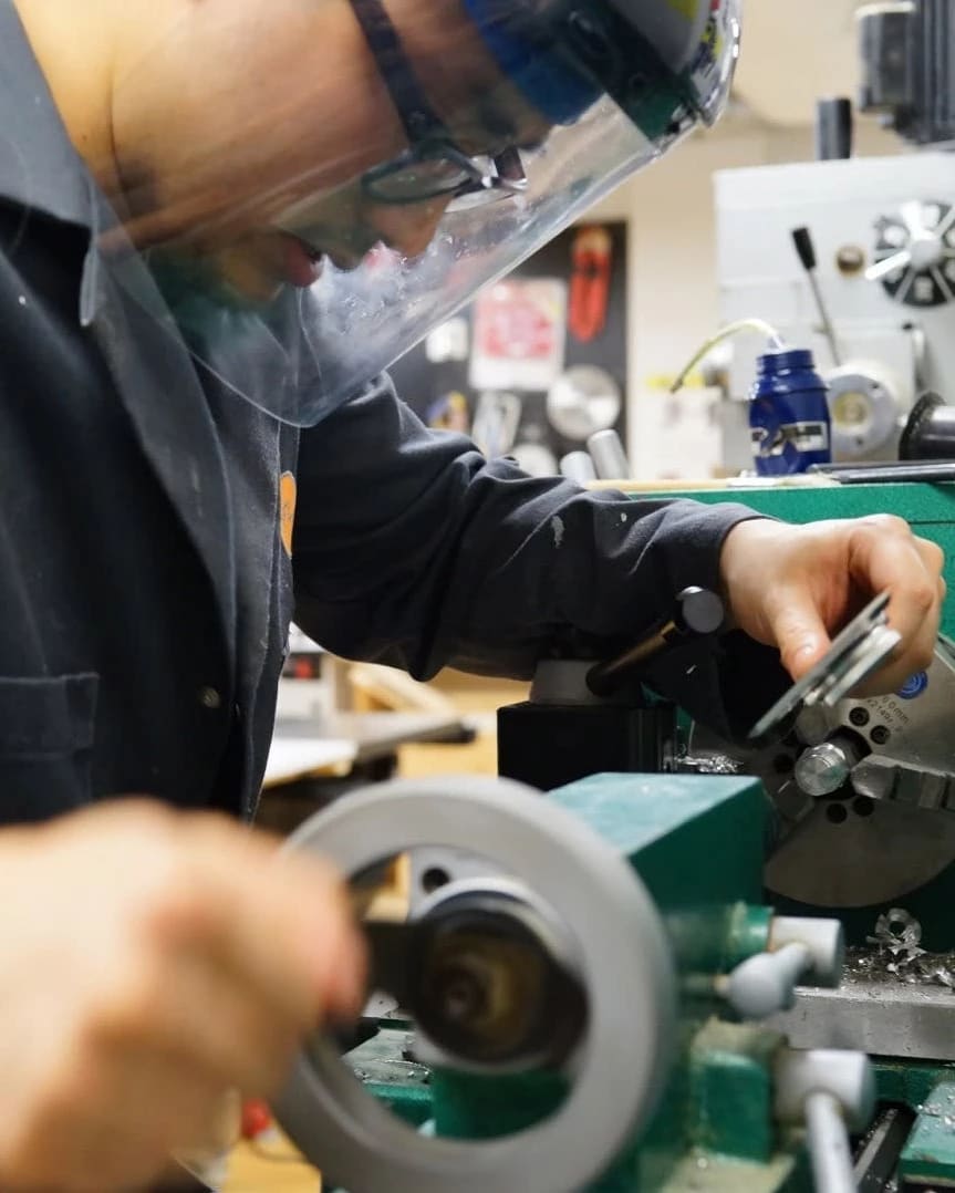 Student operating machine tool